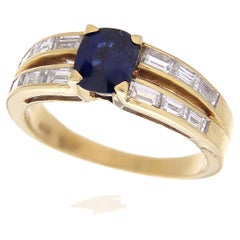 Vintage 18Kt Yellow Gold Oval Blue Sapphire 0.90 ct White Diamonds Baguette-Cut 0.80 ct