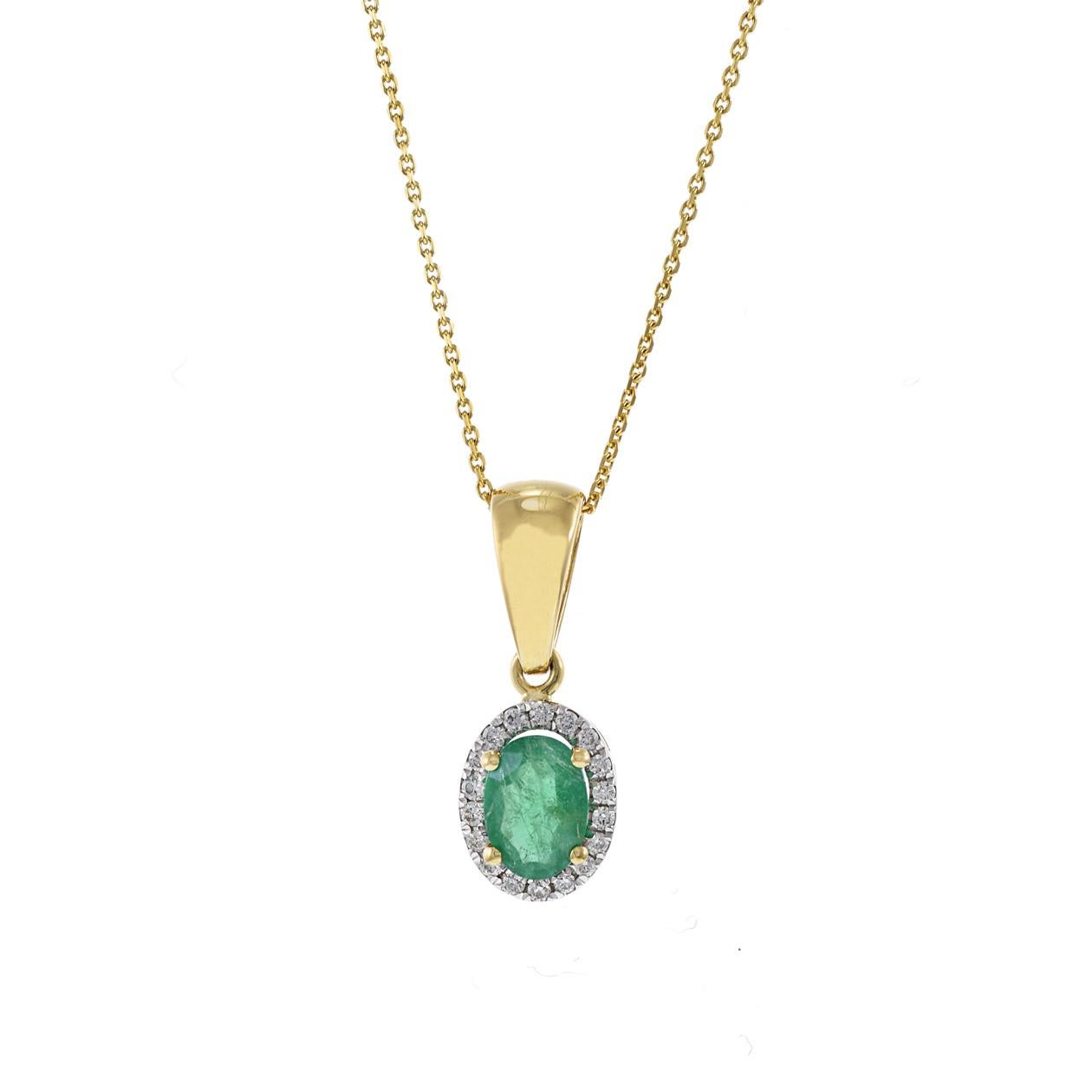 This 18kt yellow gold pendant features a captivating oval-shaped Emerald weighing 0.41 carats, encircled by a shimmering halo of round-cut diamonds totaling 0.07 carats. The combination of the vibrant Emerald and the sparkling diamonds set in