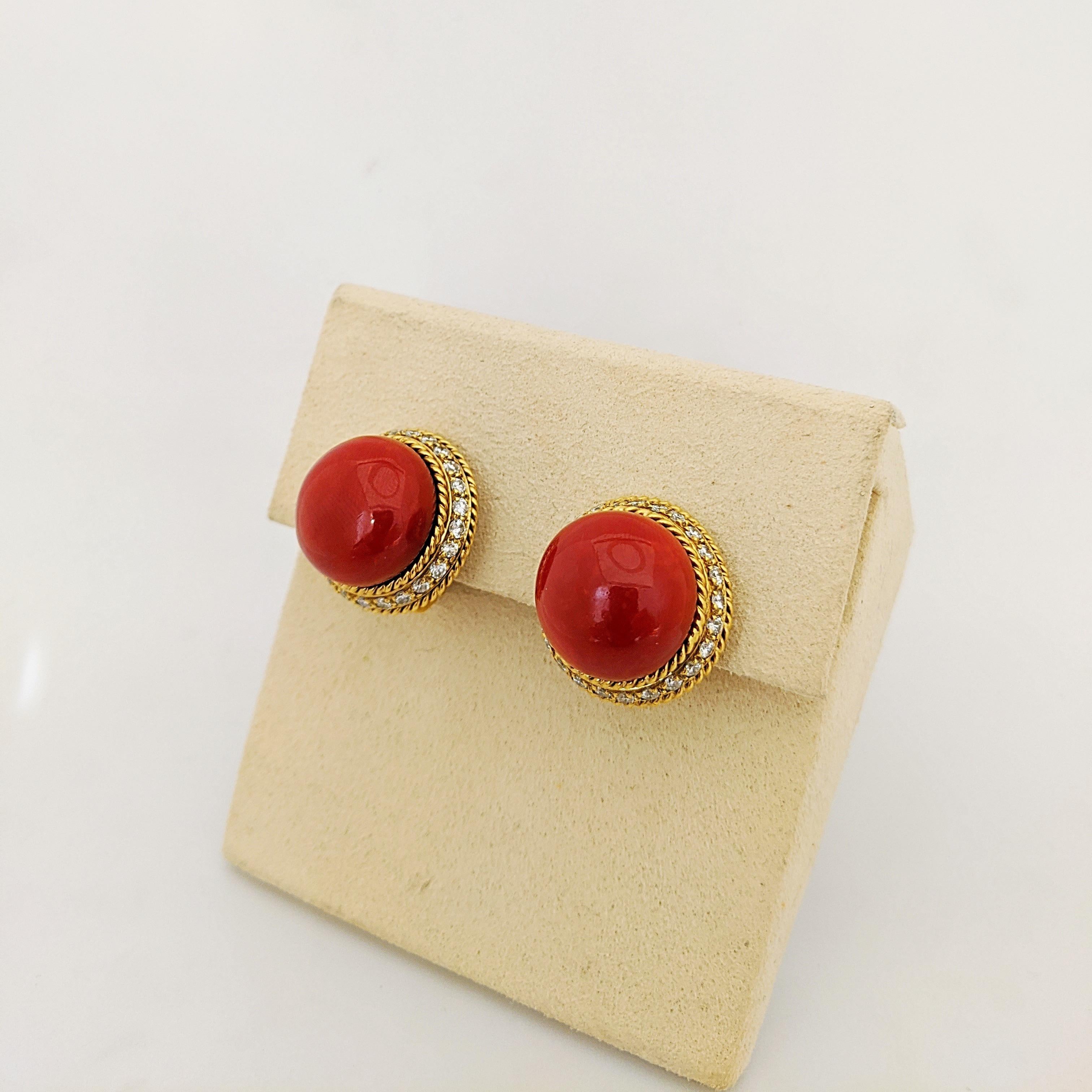 Very Rare,Very Retro

Amazing Oxblood Coral button earrings set in a beautiful 18 karat Yellow Gold setting. The rare and natural Coral gems are surrounded by Brilliant Cut Diamonds.  The Coral measures 16.5 mm. The earrings are clip on but can be