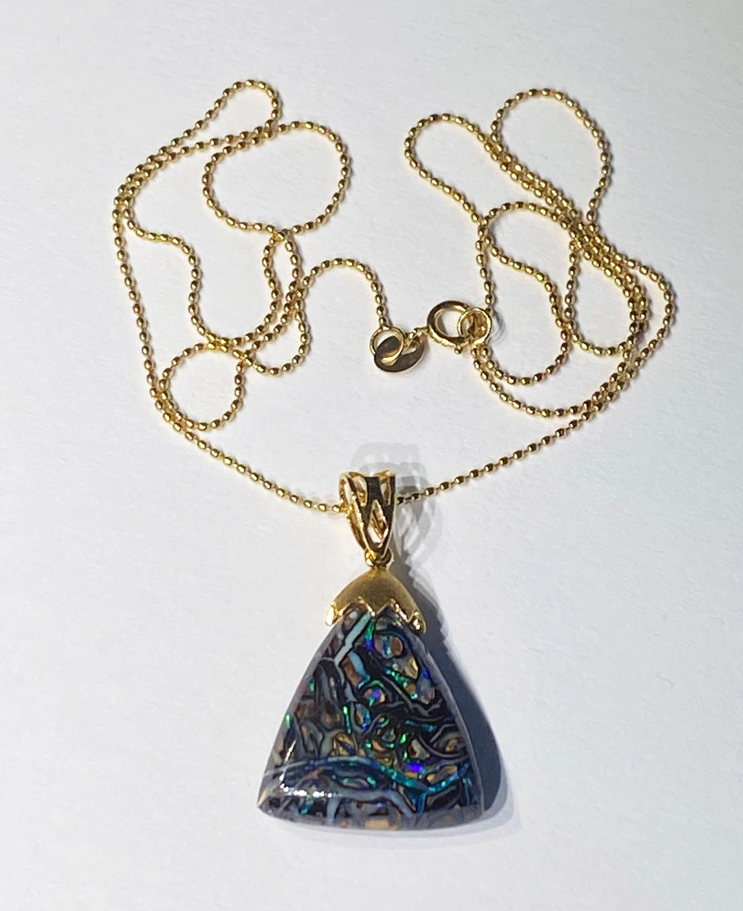 An Australian Boulder Opal Pendant set in 18kt Yellow Gold. For Sale 4