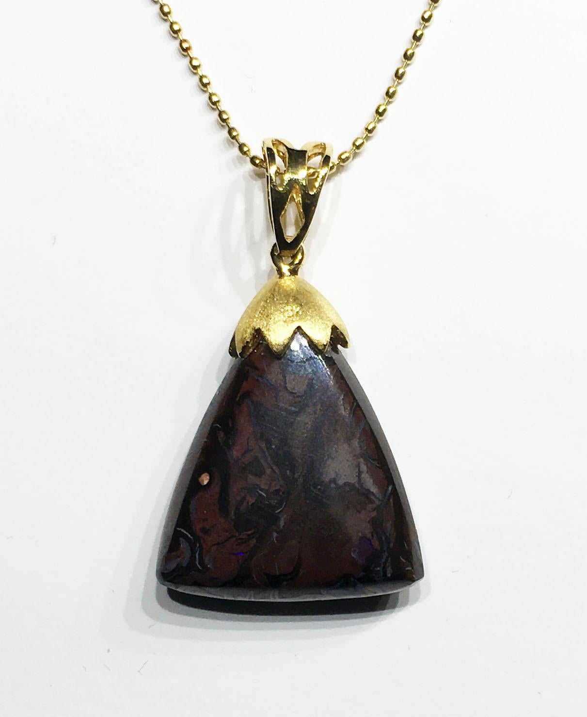 An Australian Boulder Opal Pendant set in 18kt Yellow Gold. For Sale 2