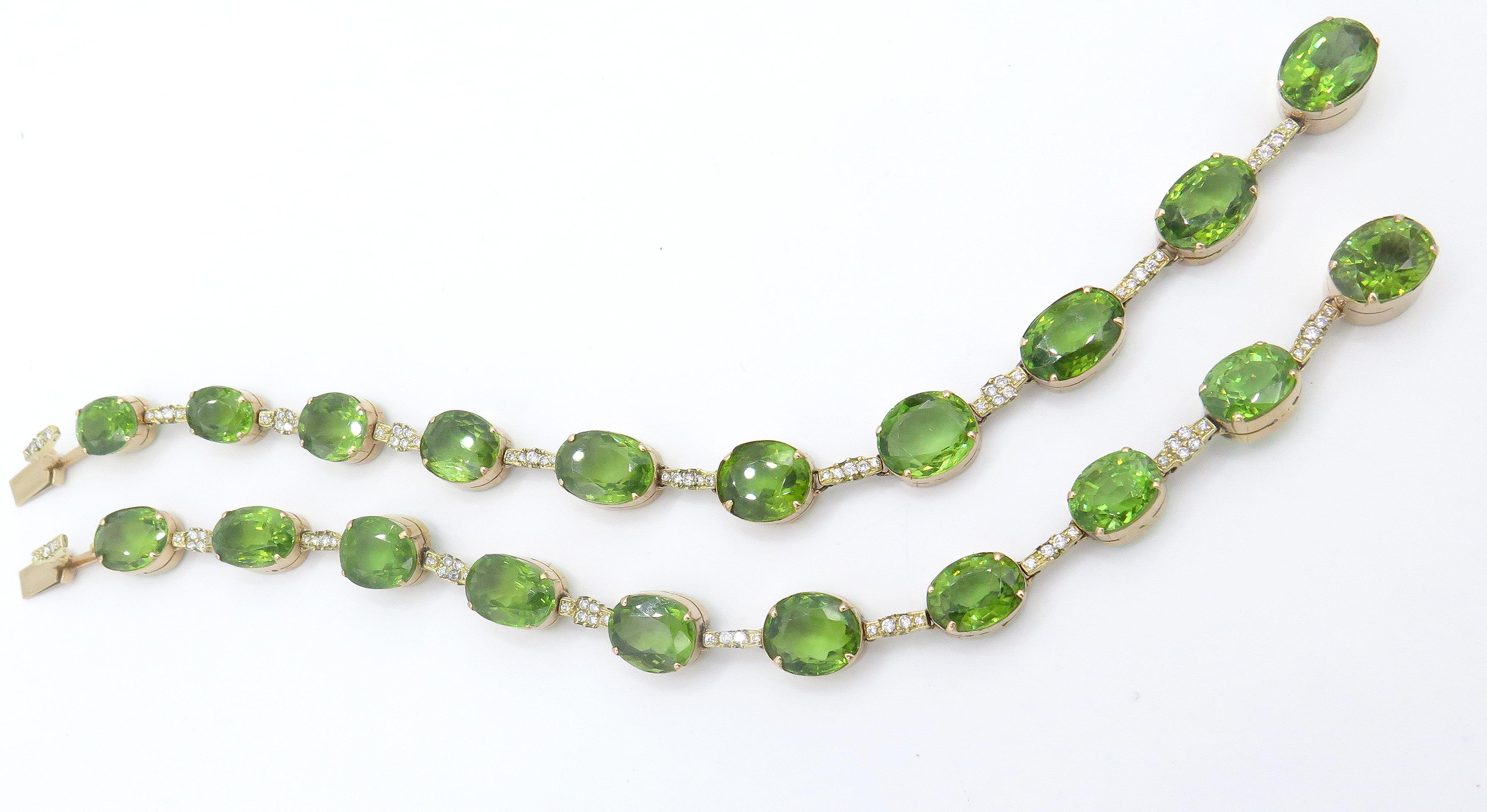 A beauitful pair of 18kt Yellow Gold bracelets. In a beautiful yellow gold polished finish with beautiful shaped peridots and diamonds. This, beautiful bracelet has a beautiful push-down clasp and with two diamonds. It, is 8in in length and weigh