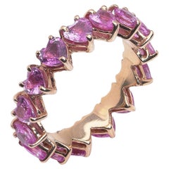 18kt yellow gold pink sapphire heart eternity ring