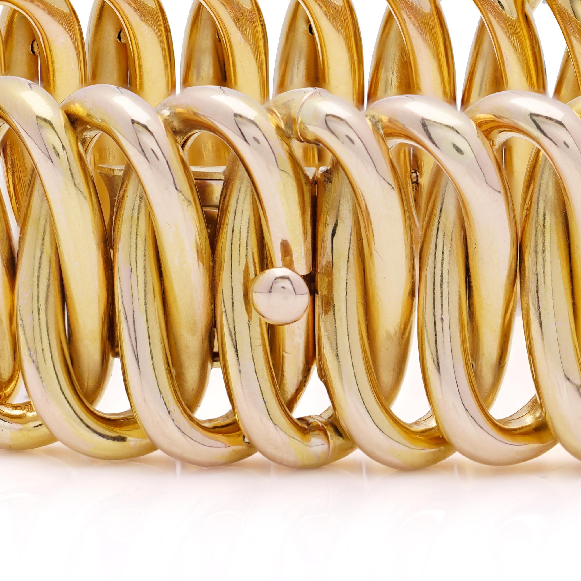18kt yellow gold Retro bracelet featuring an interlocking woven design with a polished finish, creating a dynamic, fluid aesthetic. 
Made in Circa 1940s - 1950s 

Specifications:
Material: 18 kt hollow yellow gold
Origin: French 
Design: