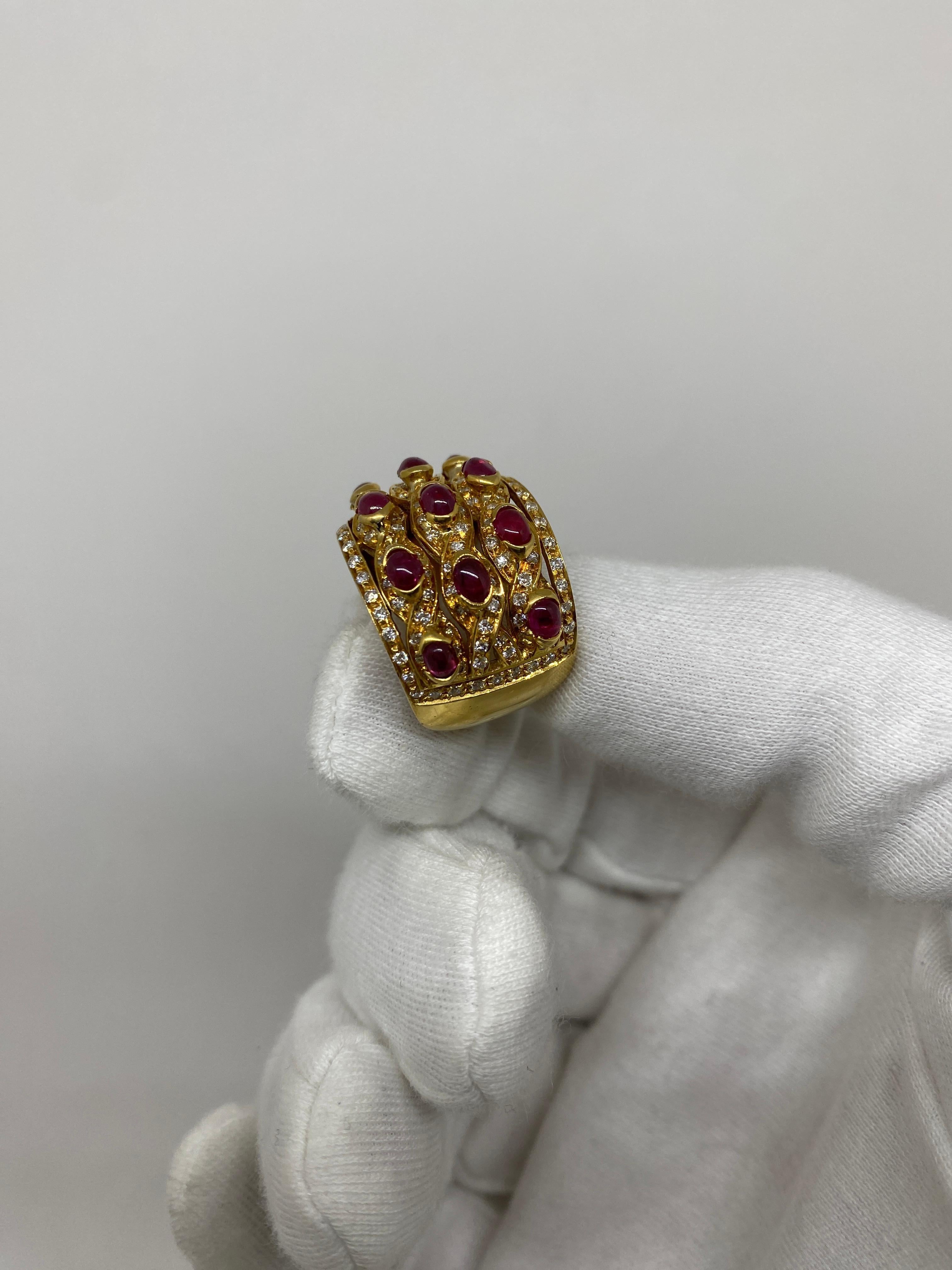 Ring made of 18kt yellow gold with natural brilliant-cut diamonds for ct.2.16 and natural red cabochon-cut rubies for ct.4.40

Welcome to our jewelry collection, where every piece tells a story of timeless elegance and unparalleled craftsmanship. As