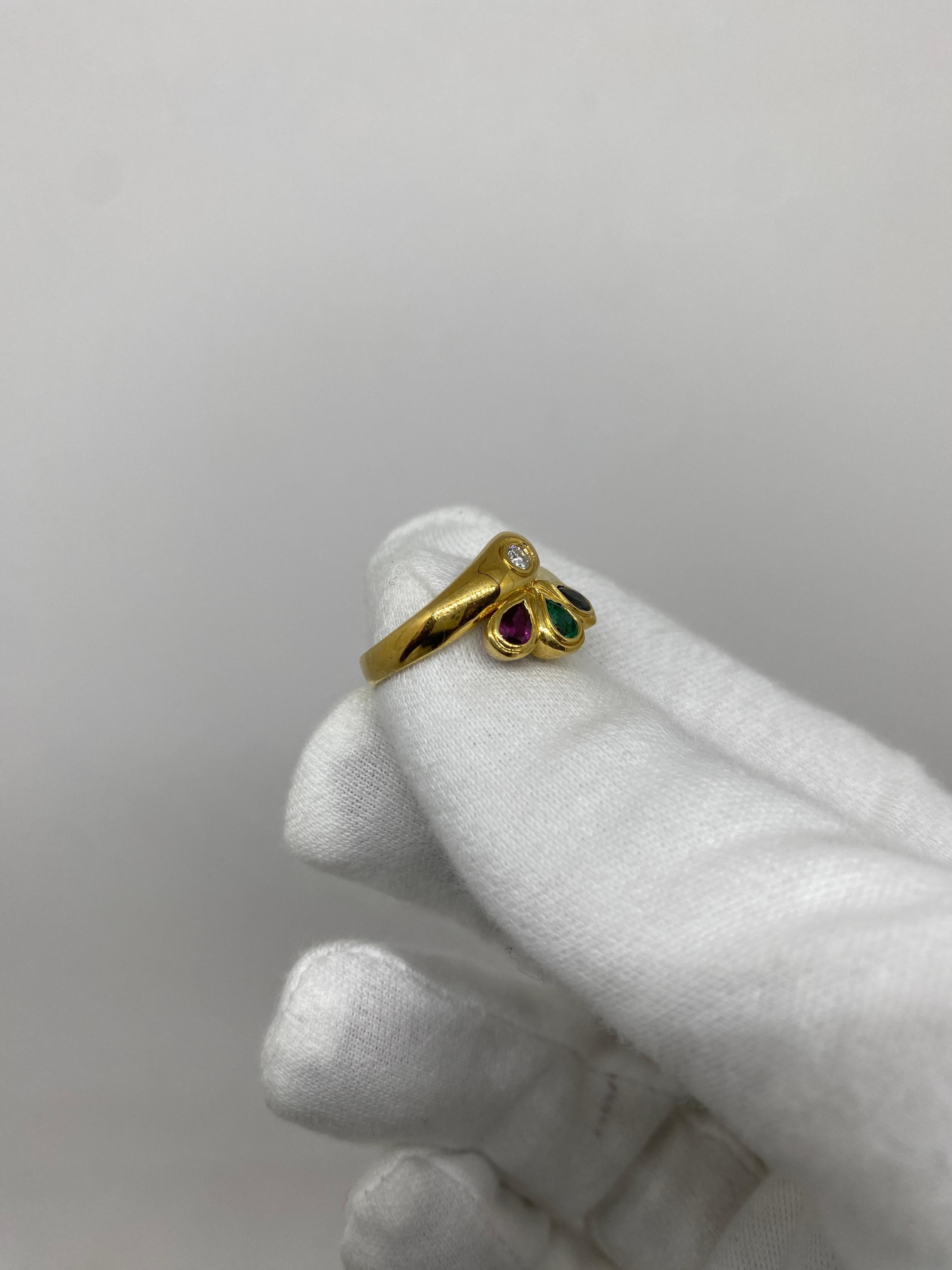 Ring made of 18kt yellow gold with a brilliant-cut diamond and a ruby an emerald and a drop-cut sapphire

Welcome to our jewelry collection, where every piece tells a story of timeless elegance and unparalleled craftsmanship. As a family-run