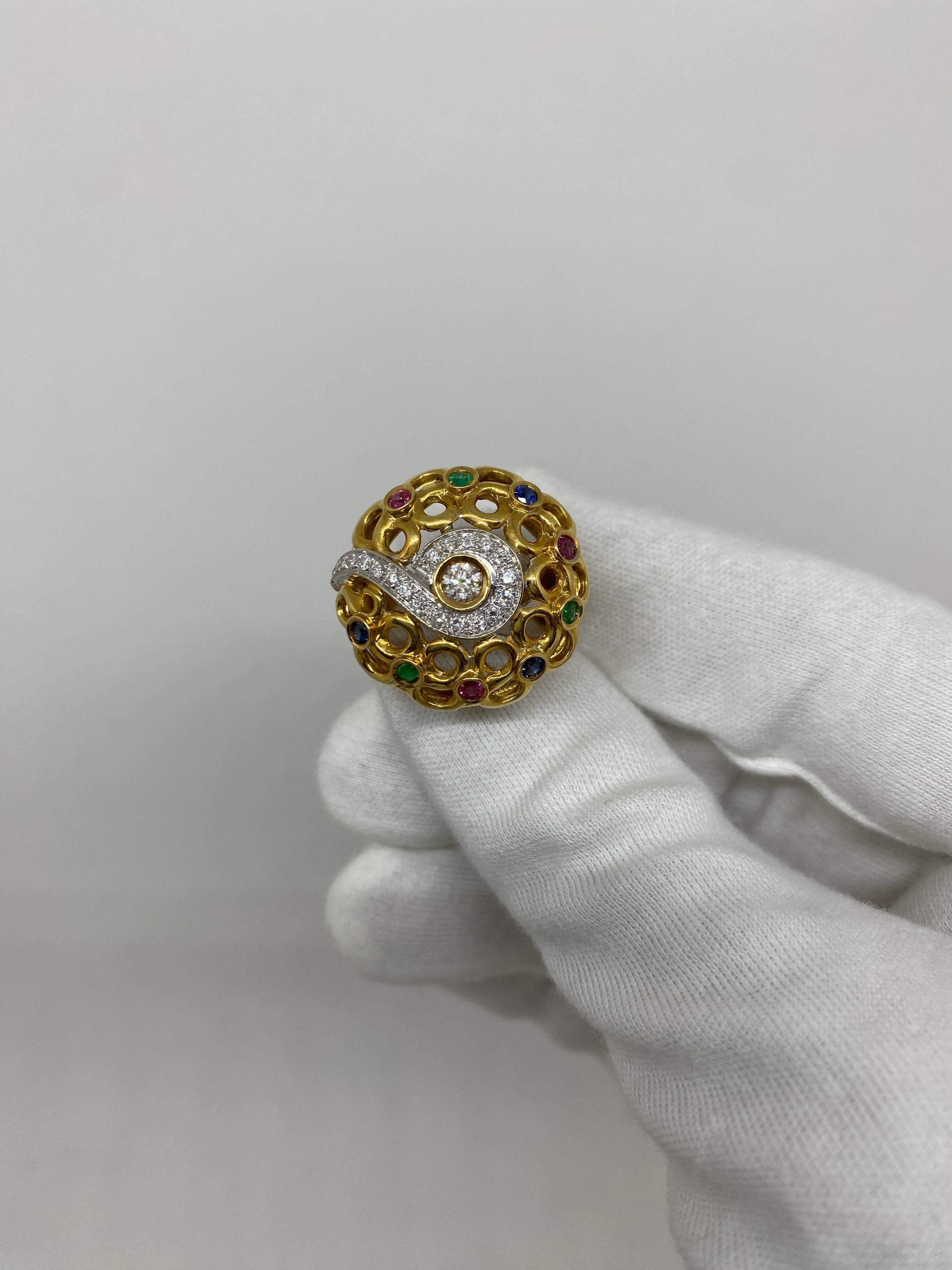Ring made of 18kt yellow gold with natural brilliant-cut diamonds for ct.0.53, blue sapphires for ct .0.21 red rubies for ct .0.23 and green emeralds 0.12

Welcome to our jewelry collection, where every piece tells a story of timeless elegance and