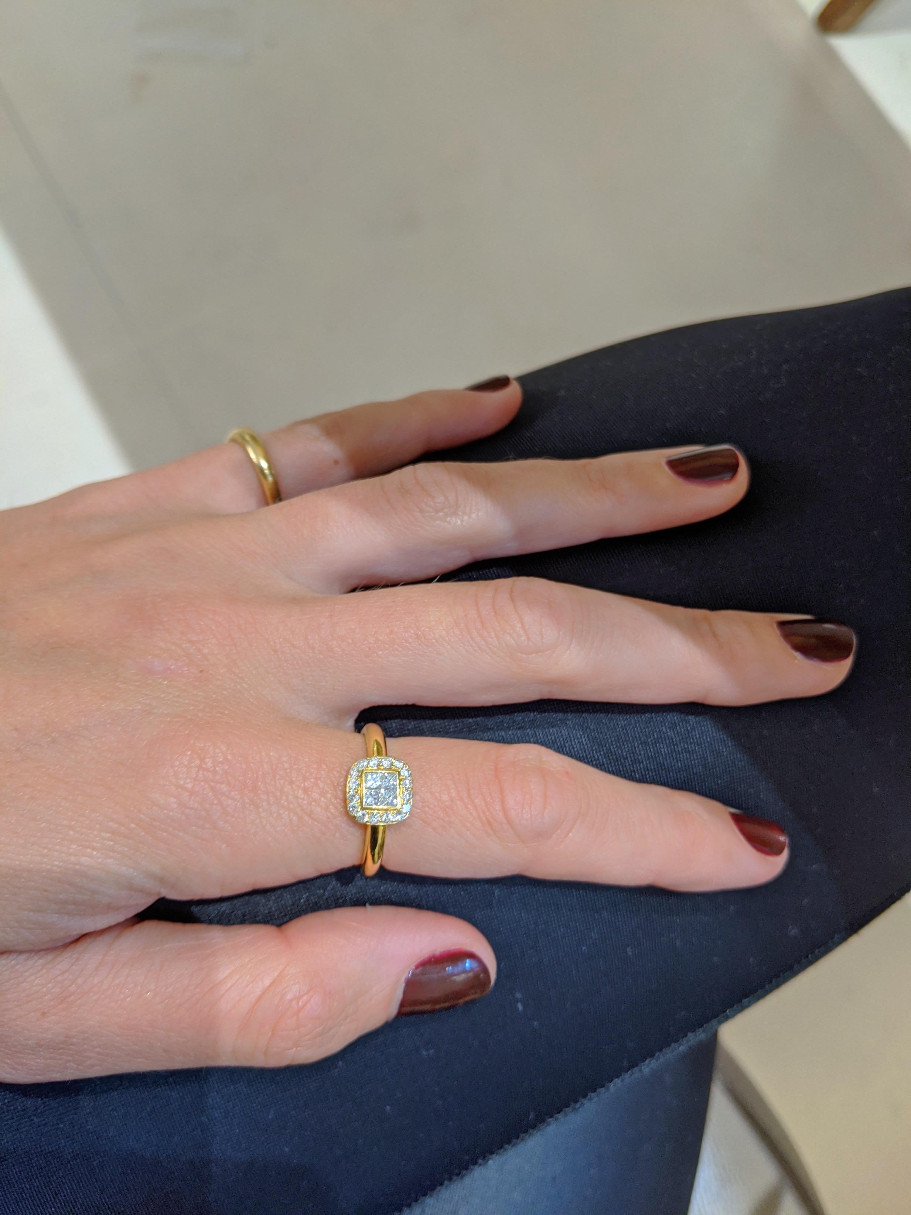 Modern 18 Karat Yellow Gold Ring with .55 Carat Princess Cut and Round Diamonds For Sale