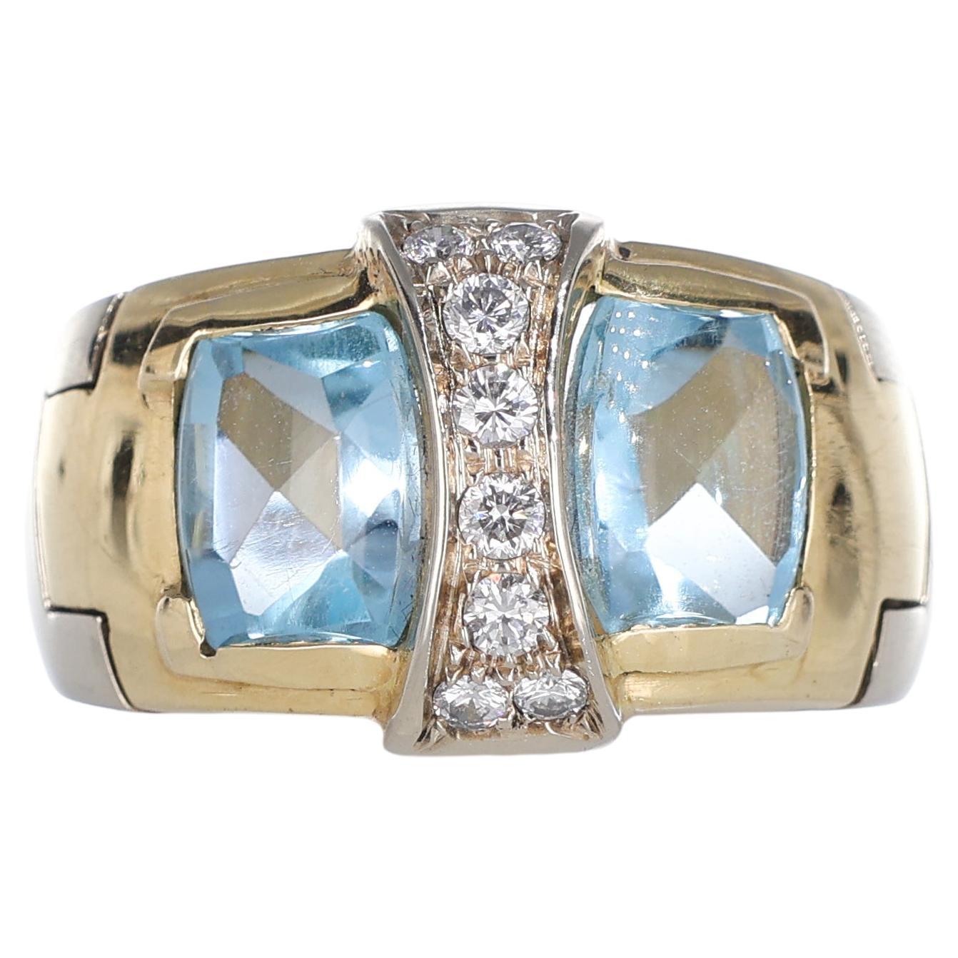 18kt Yellow Gold Ring with Blue Topazes and Diamonds