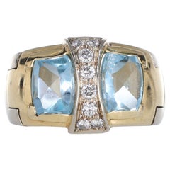 18kt Yellow Gold Ring with Blue Topazes and Diamonds