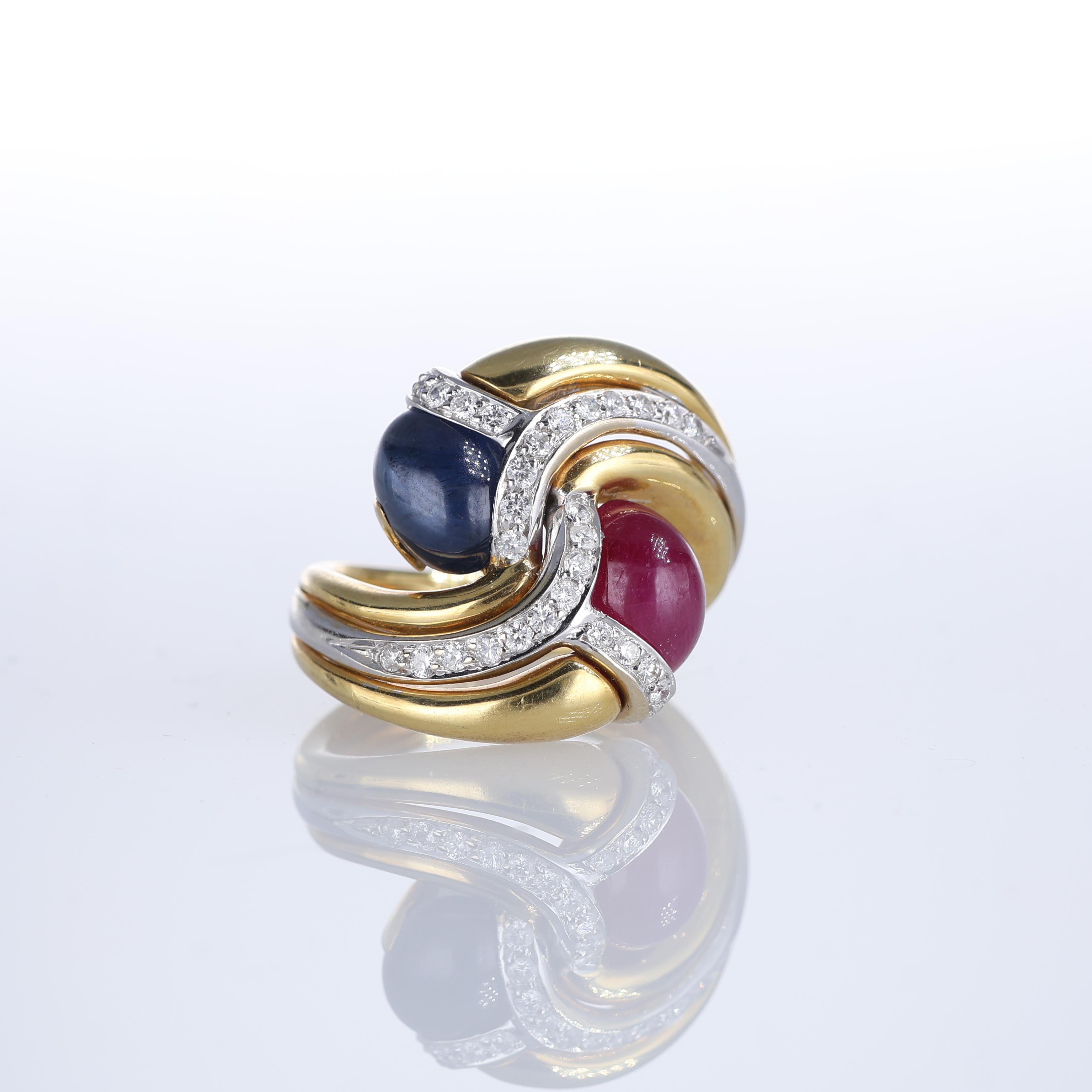 IMPORTANT NOTE:
✔ No additional costs will be added to this order.
✔ Shipping and customs duties are fully covered by us.
--------------------
A striking 18kt yellow gold ring featuring a dynamic design. The piece showcases a cabochon-cut sapphire