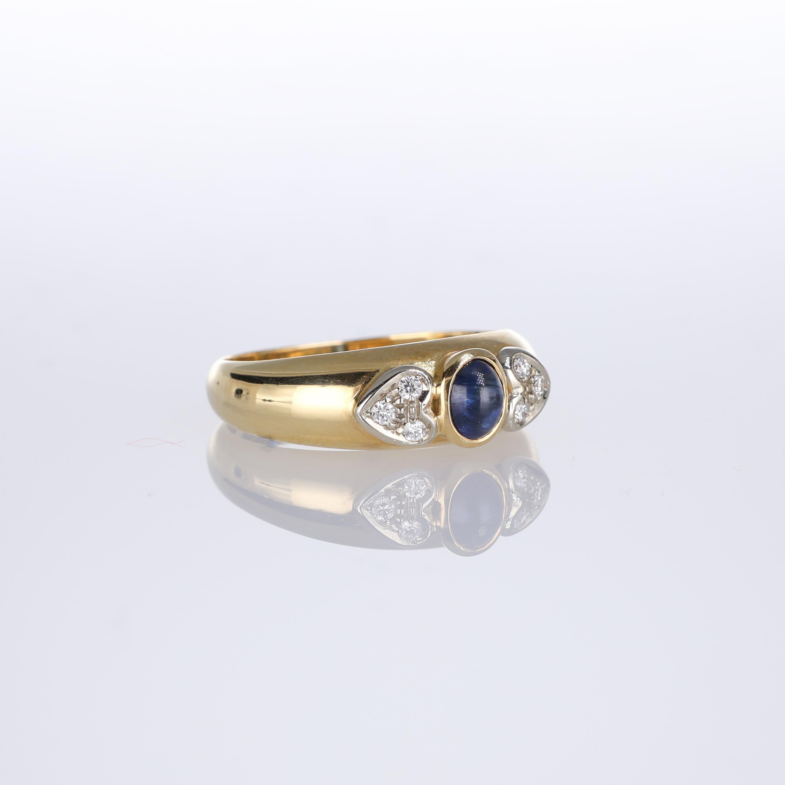 Brilliant Cut 18kt Yellow Gold Ring with Cabochon Sapphire and Diamond Hearts For Sale
