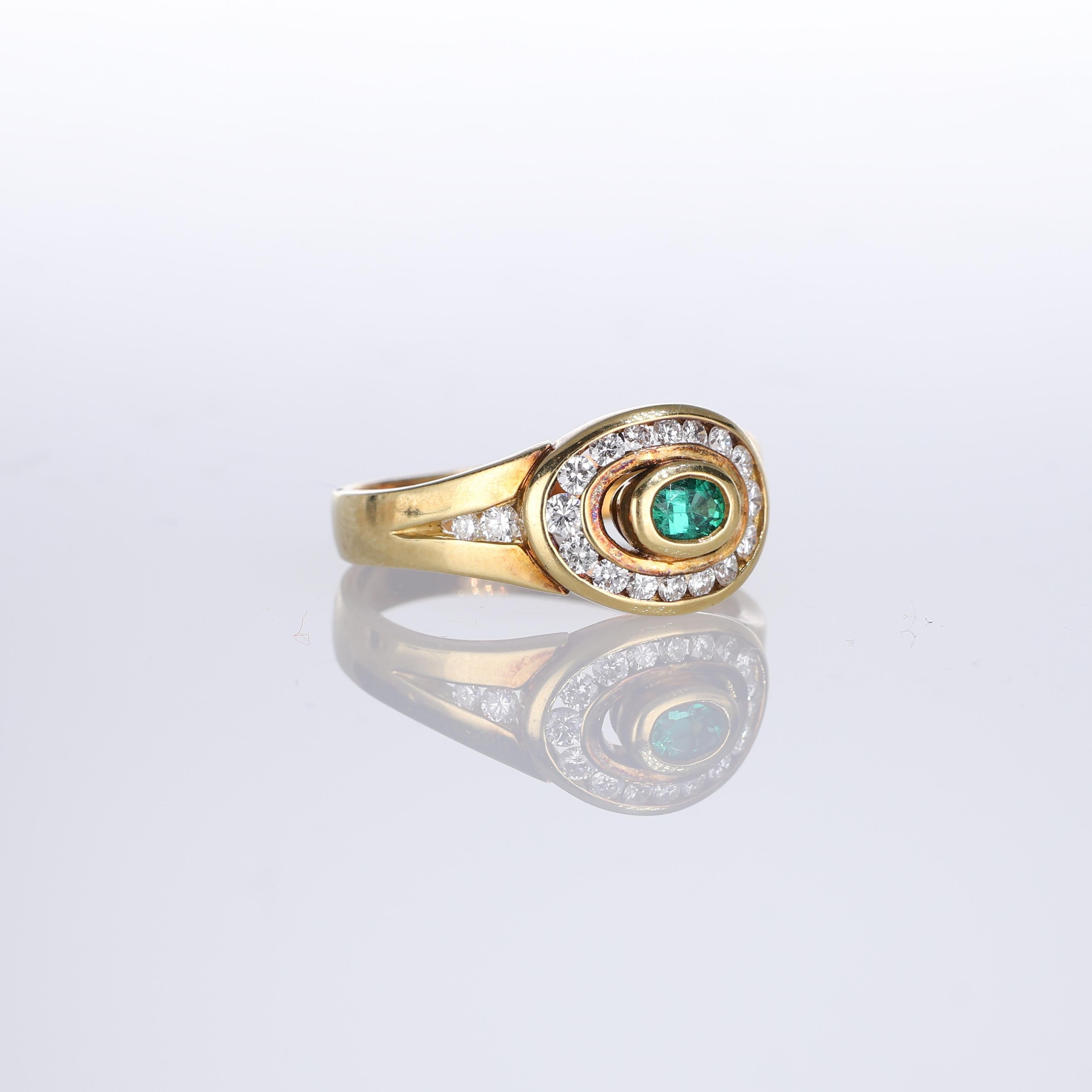 Brilliant Cut 18kt Yellow Gold Ring with Central Emerald and Diamond Frame For Sale