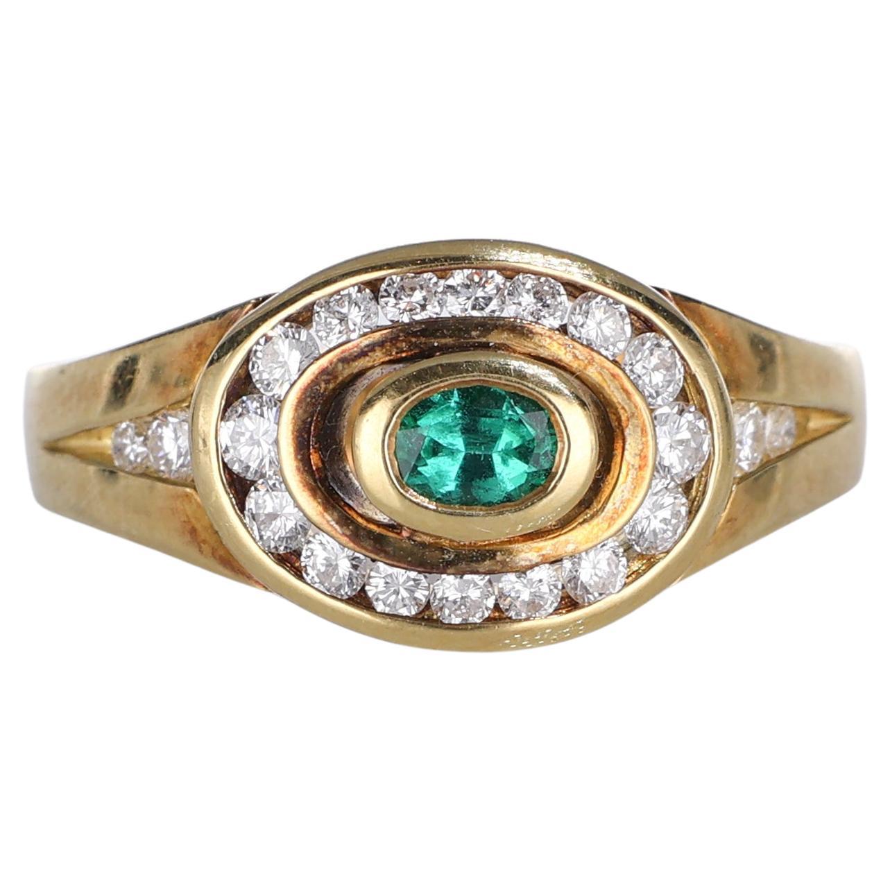 18kt Yellow Gold Ring with Central Emerald and Diamond Frame For Sale