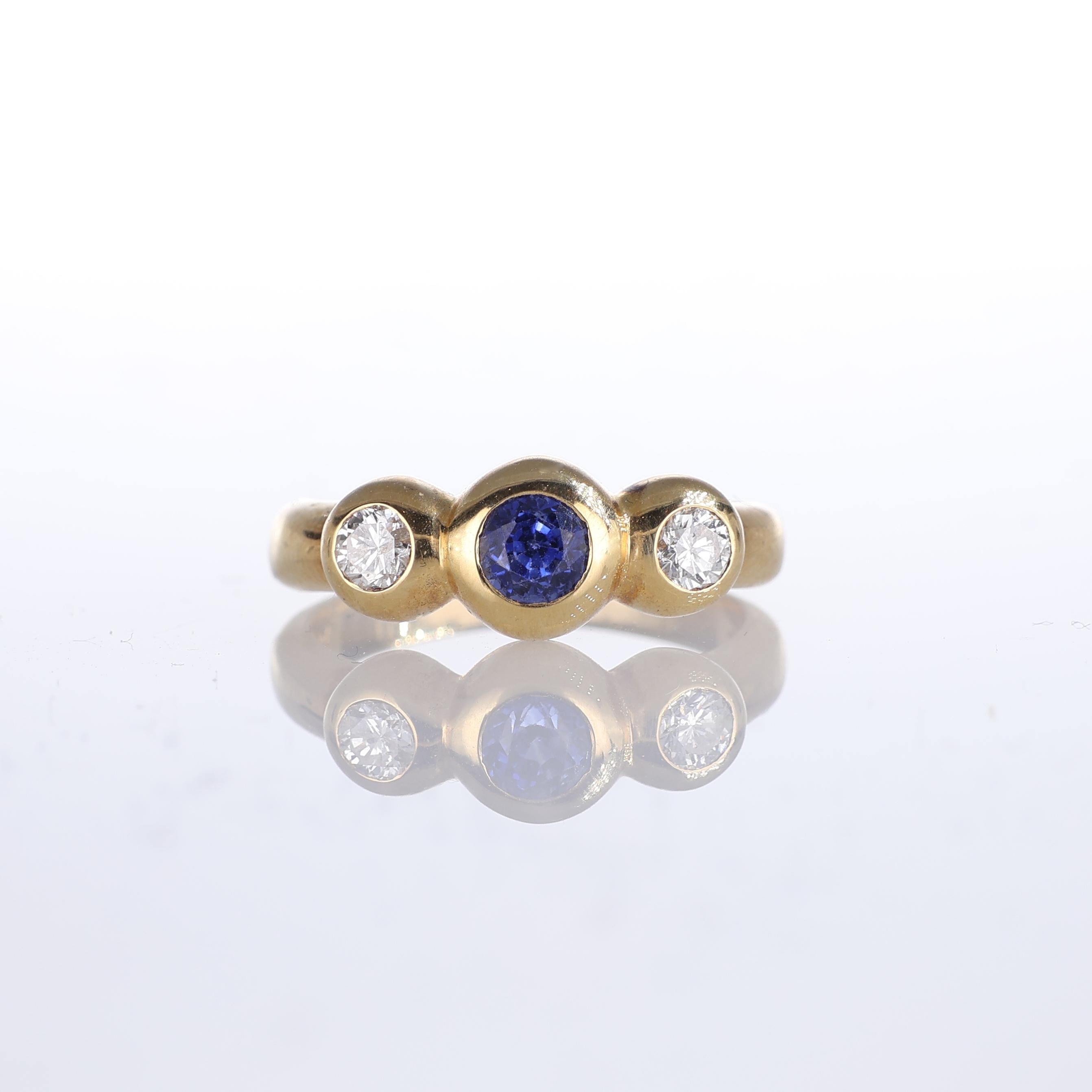 IMPORTANT NOTE:
✔ No additional costs will be added to this order.
✔ Shipping and customs duties are fully covered by us.
--------------------
This elegant 18kt yellow gold ring features a round-cut sapphire as the centerpiece, complemented by two