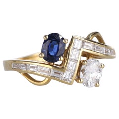 18kt Yellow Gold Ring with Diamonds and Sapphire