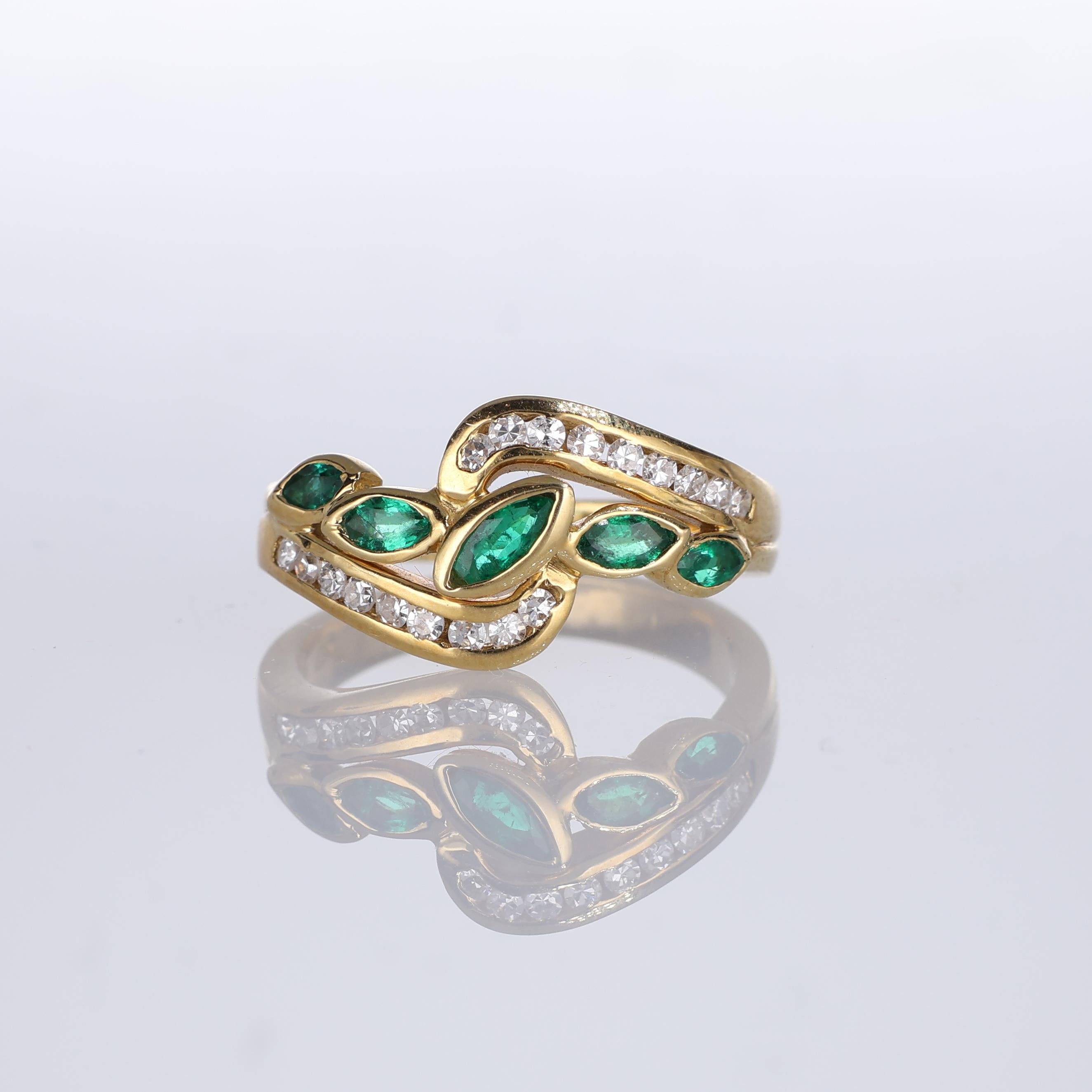 IMPORTANT NOTE:
✔ No additional costs will be added to this order.
✔ Shipping and customs duties are fully covered by us.
--------------------
An elegant 18kt yellow gold ring featuring a captivating design of marquise-shaped emeralds interlaced
