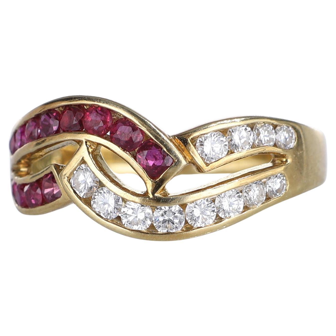 18kt Yellow Gold Ring with Intertwined Rubies and Diamonds