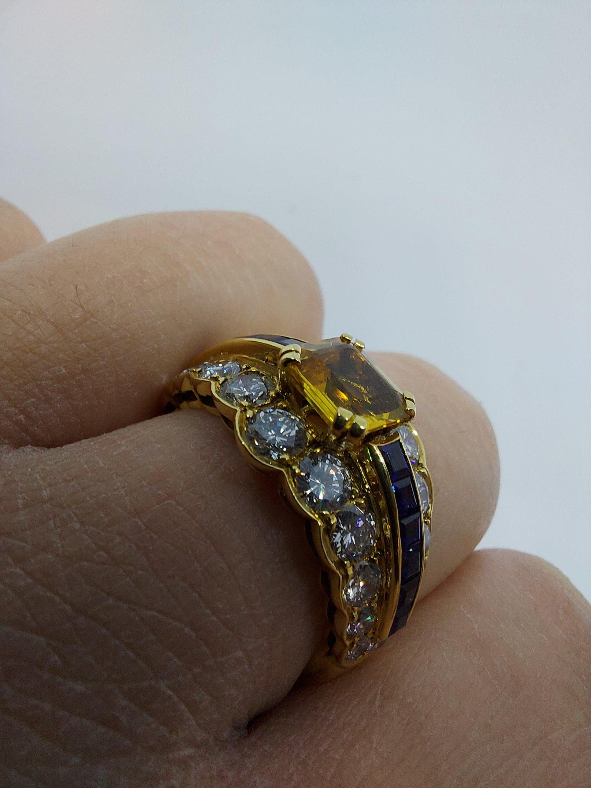 18 Karat Yellow Gold Ring with Large Yellow Sapphire Blue Sapphires and Diamonds For Sale 13