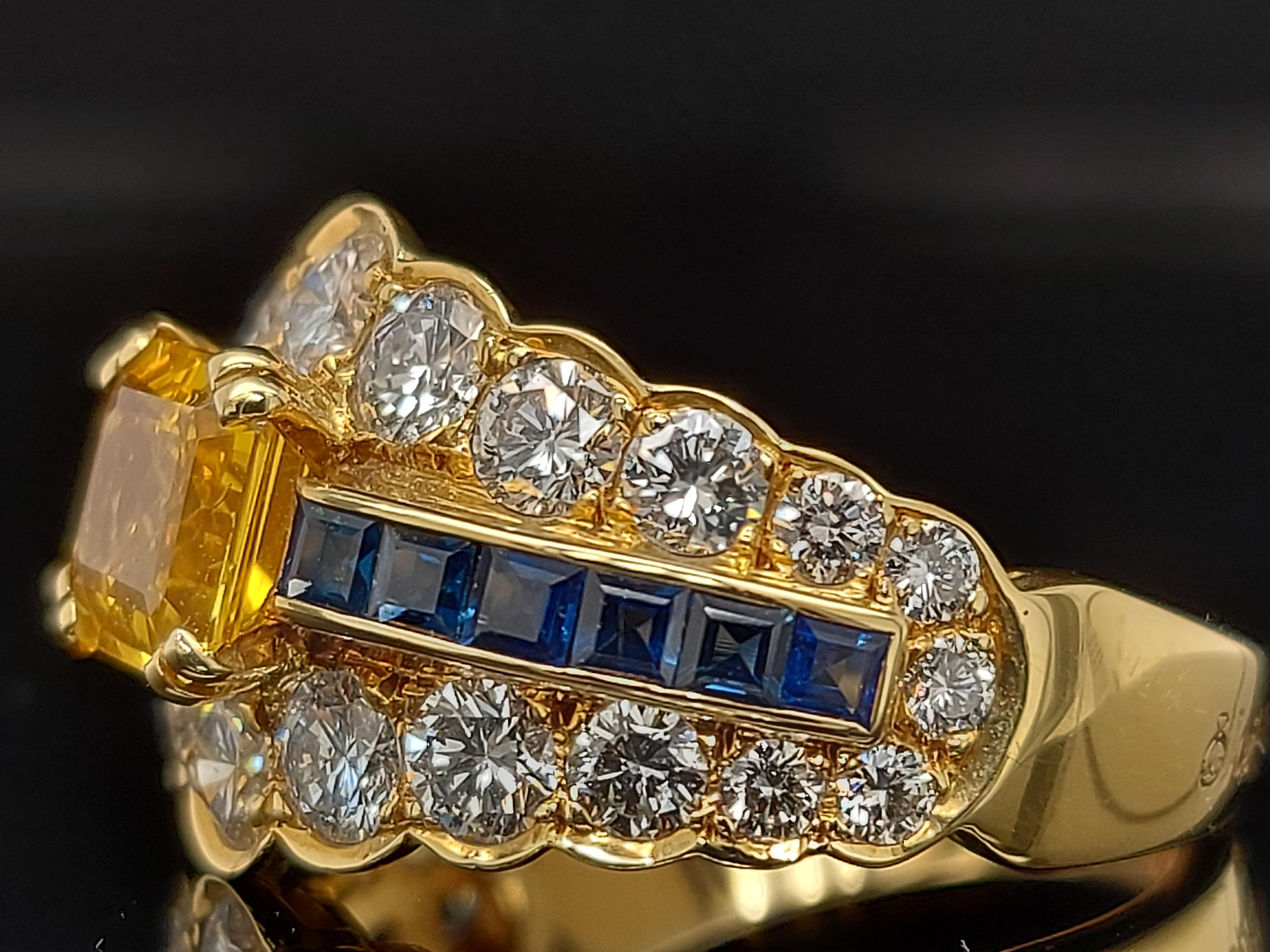 Women's or Men's 18 Karat Yellow Gold Ring with Large Yellow Sapphire Blue Sapphires and Diamonds For Sale
