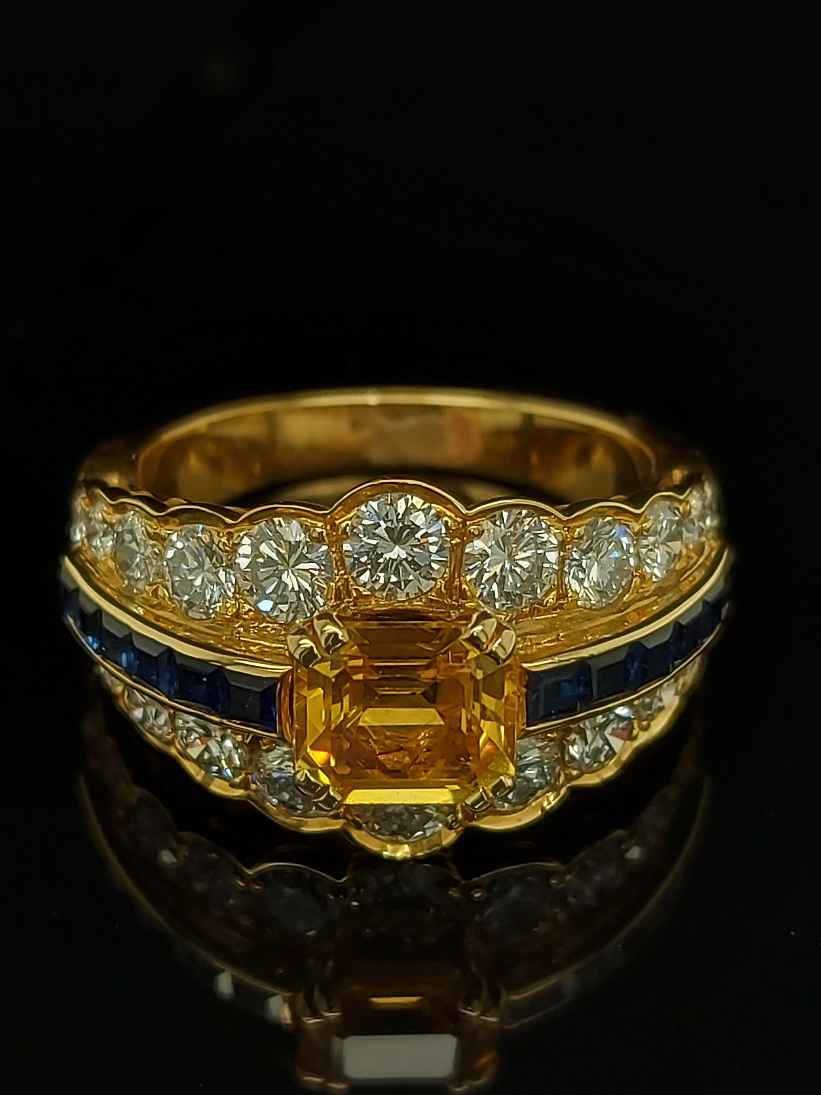 18 Karat Yellow Gold Ring with Large Yellow Sapphire Blue Sapphires and Diamonds For Sale 3