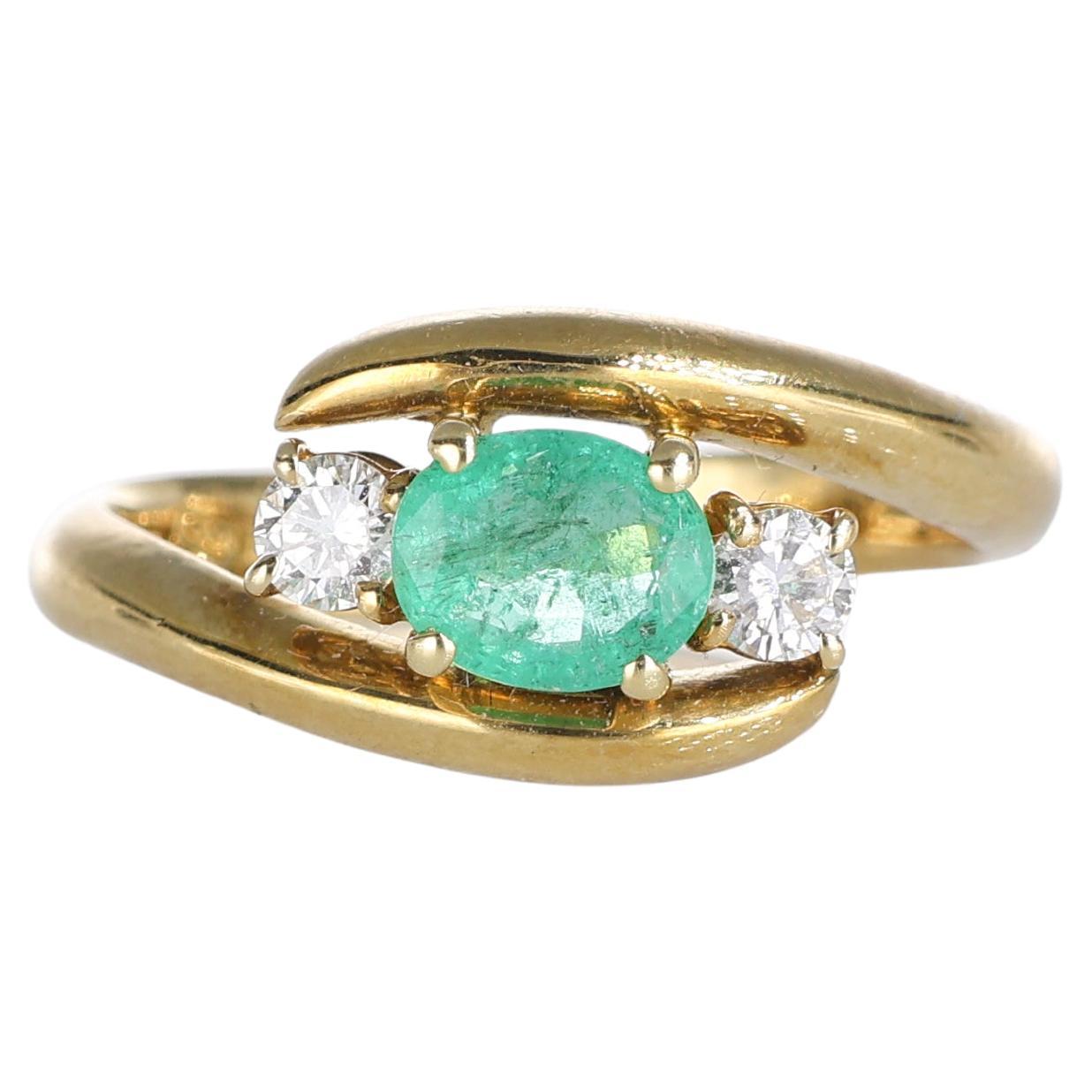 18kt Yellow Gold Ring with Oval Emerald and Brilliant Diamonds