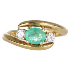 18kt Yellow Gold Ring with Oval Emerald and Brilliant Diamonds