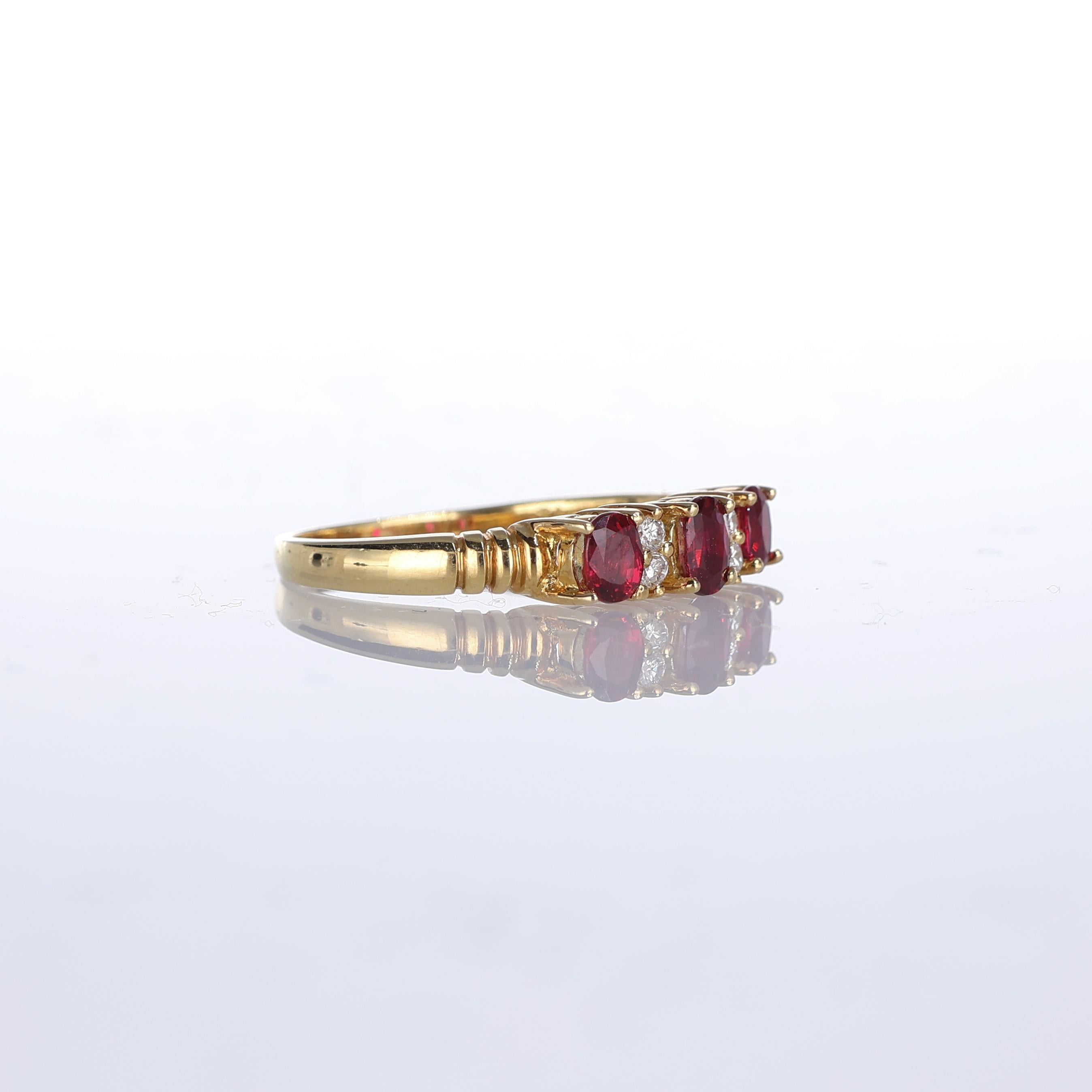 Brilliant Cut 18kt Yellow Gold Ring with Oval Rubies and Diamonds For Sale