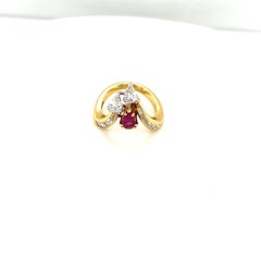 18KT Yellow Gold Ring with Pear and Baguette 0.90Ct Diamond 0.51Ct. Ruby