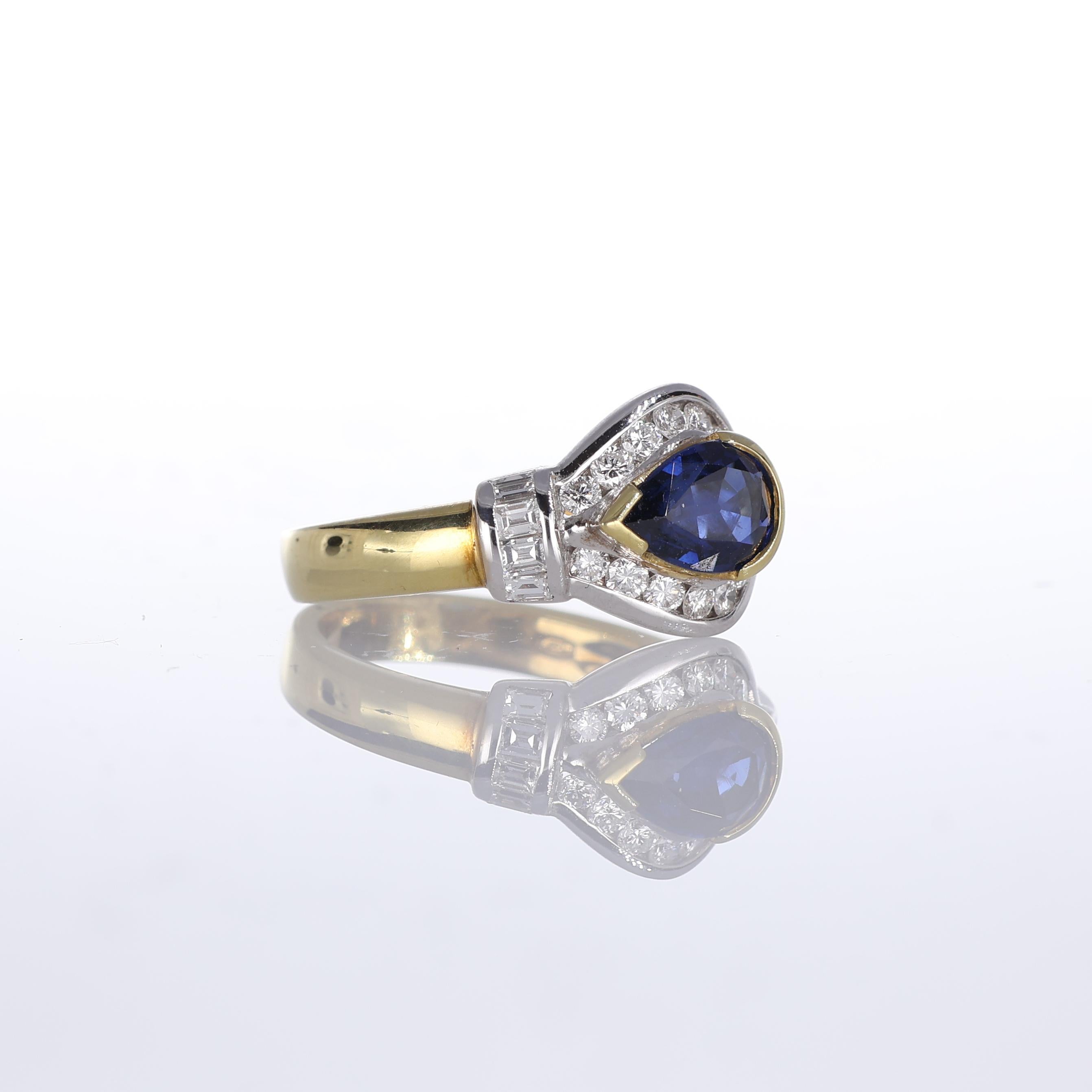 Brilliant Cut 18kt Yellow Gold Ring with Pear-Cut Sapphire and Diamond Frame For Sale