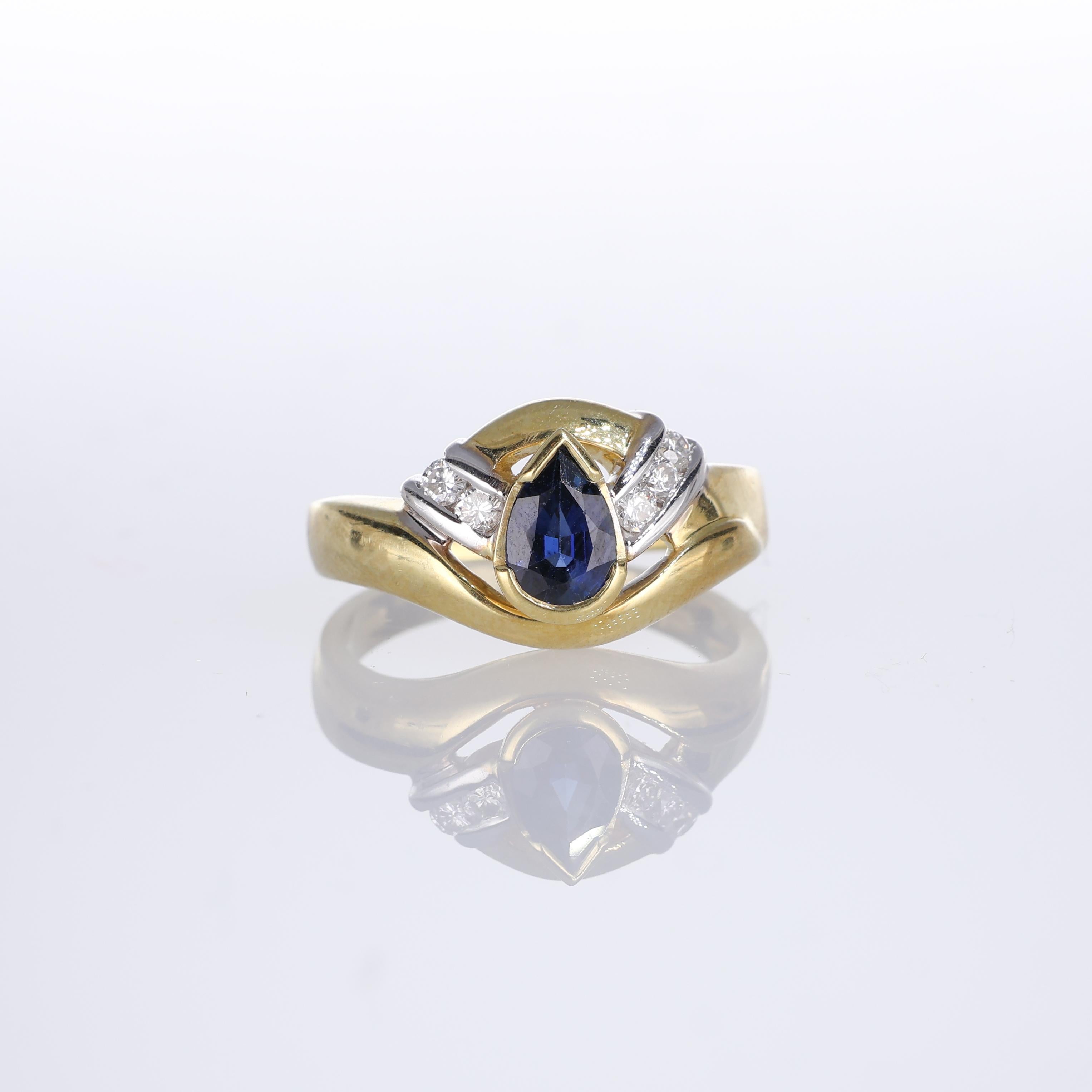 IMPORTANT NOTE:
✔ No additional costs will be added to this order.
✔ Shipping and customs duties are fully covered by us.
--------------------
A stunning 18kt yellow gold ring featuring a central pear-cut sapphire weighing 0.79 carats. The design is