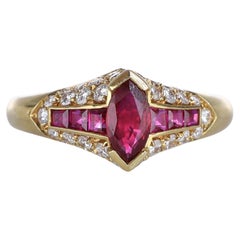 18kt Yellow Gold Ring with Ruby Baguettes and Diamonds