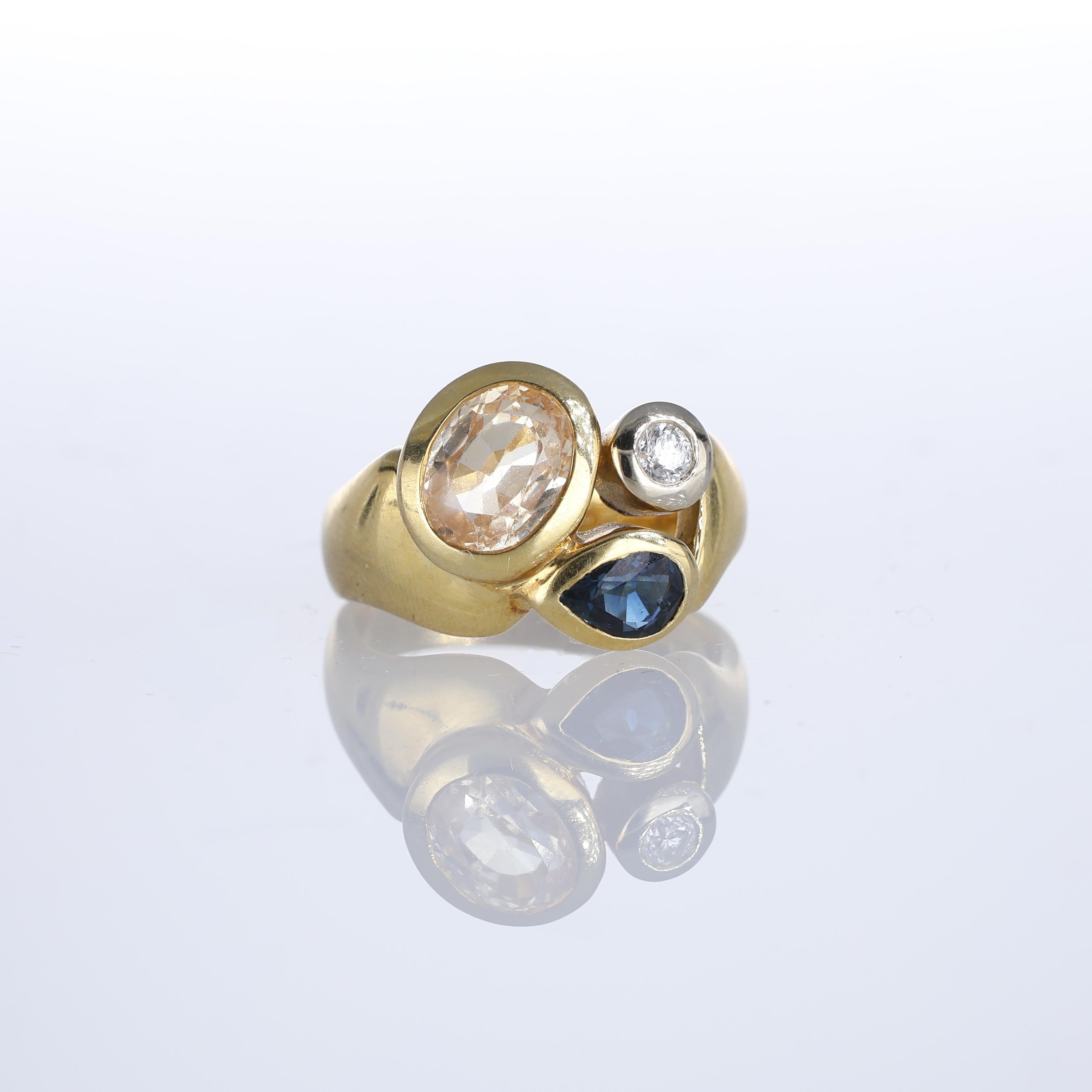 IMPORTANT NOTE:
✔ No additional costs will be added to this order.
✔ Shipping and customs duties are fully covered by us.
--------------------
A contemporary 18kt yellow gold ring showcasing a harmonious trio of gemstones. The centerpiece features