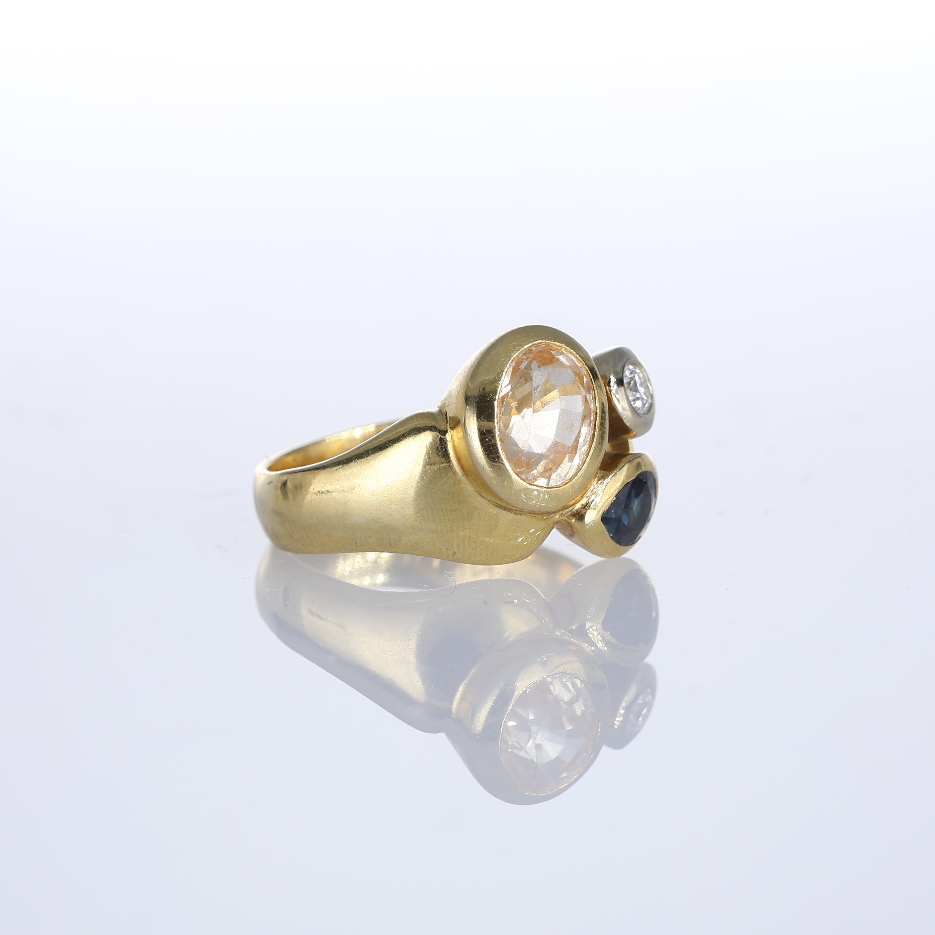 Brilliant Cut 18kt Yellow Gold Ring with Yellow Sapphire, Blue Sapphire, and Diamond For Sale
