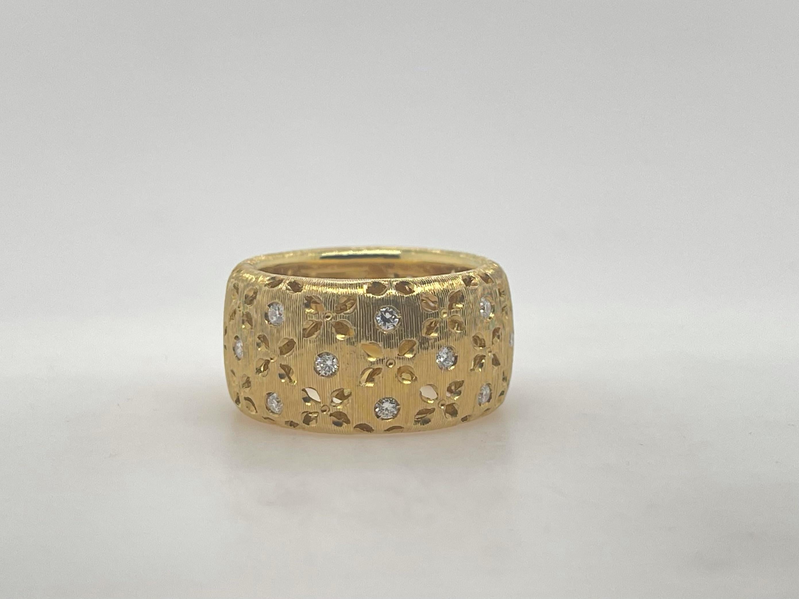 Roberto Coin Matte Flower Diamond Band 
Estate 
18kt Yellow Gold 
16 Diamonds= 0.32ct 
