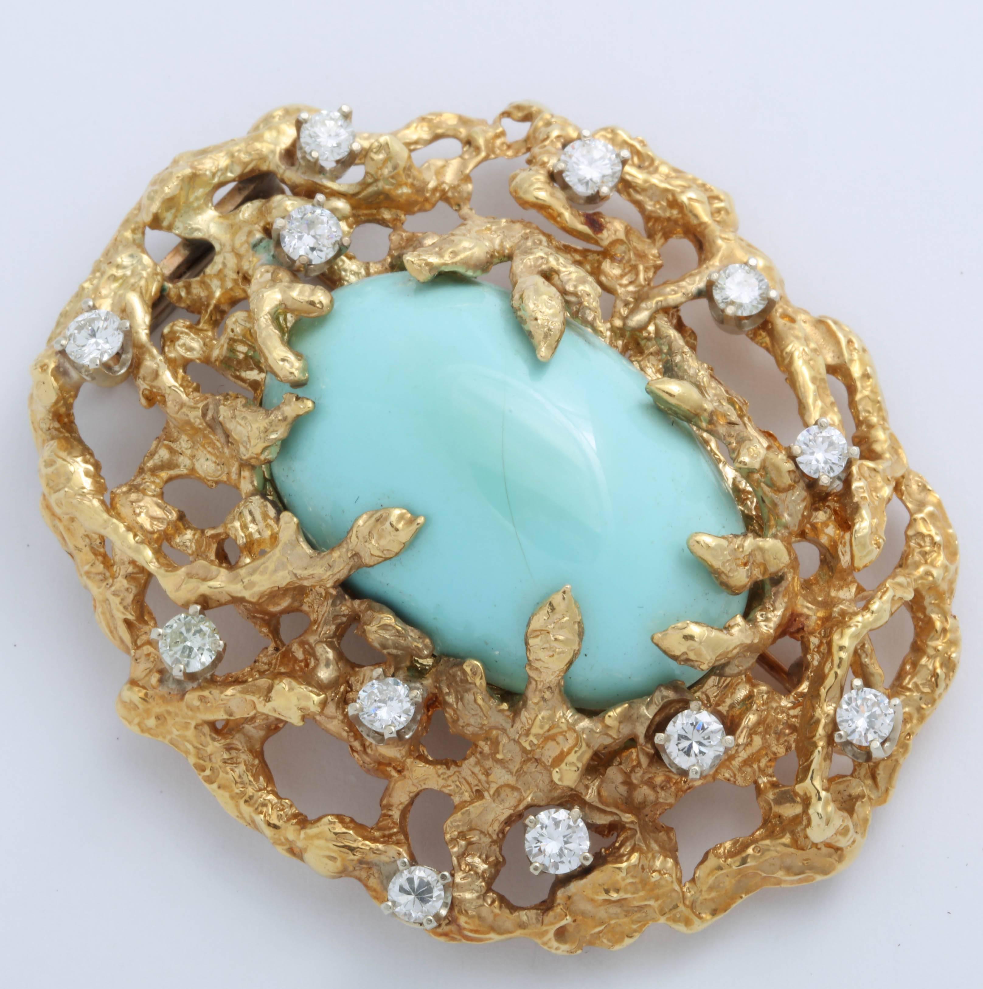 Oval Robin's Egg Blue Turquoise Brooch in Pierced 18kt Yellow double pronged Clip.  Set with 12 Prong set full cut Diamonds in white Gold.   Diamond weight -approximately - 2 carats.  Very luscious and oversized and poetic -  A veritable Gilded