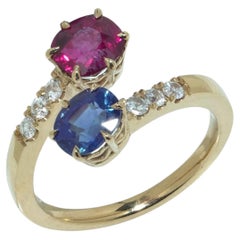 18KT Yellow Gold Ruby, Sapphire and Diamond Crossover Ring