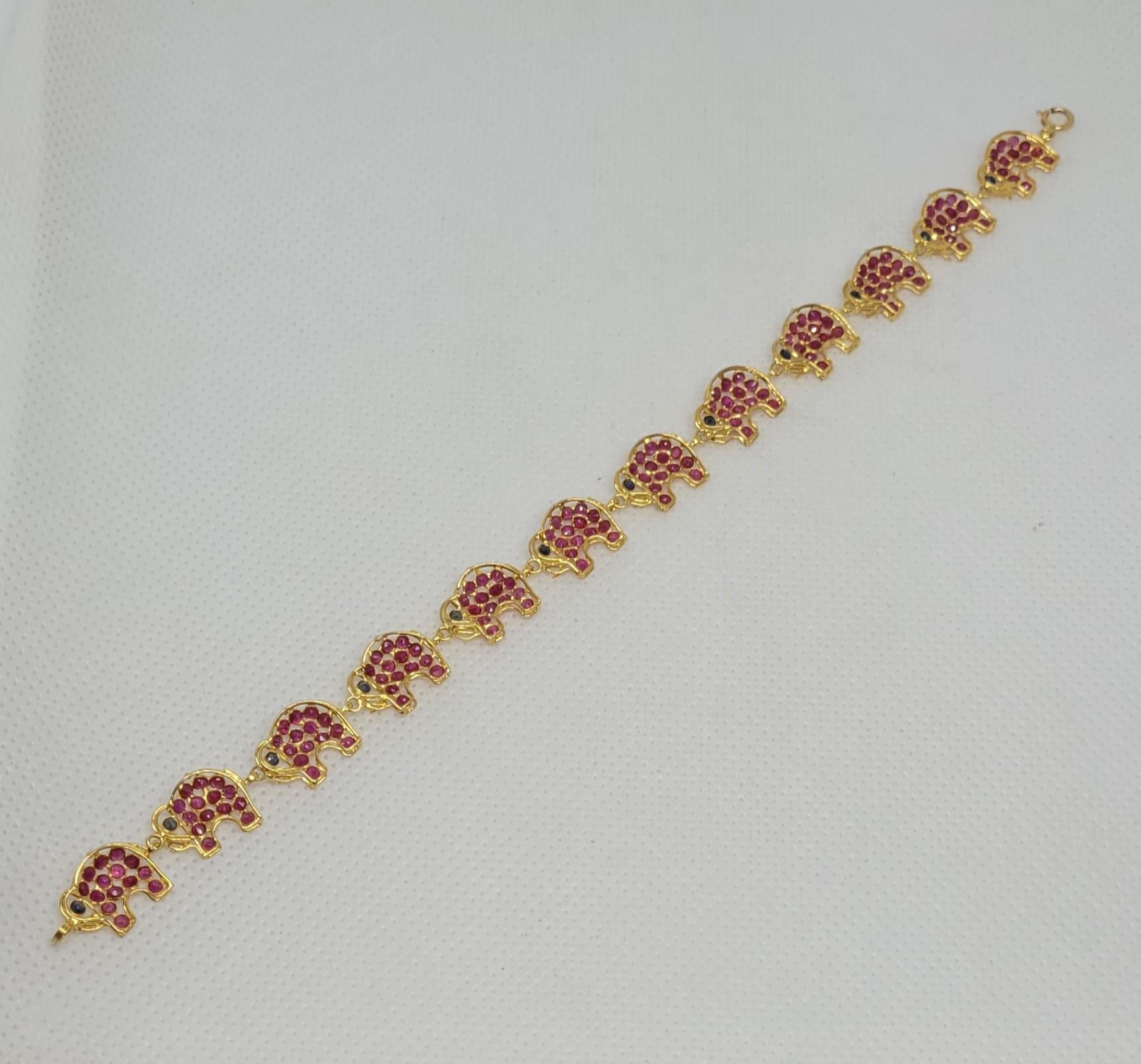 Women's 18kt Yellow Gold Ruby Sapphire Elephant Link Bracelet 7 Inches 10mm Wide 6 gr For Sale