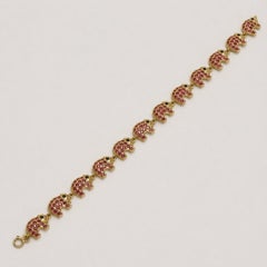 18kt Yellow Gold Ruby Sapphire Elephant Link Bracelet 7 Inches 10mm Wide 6 gr