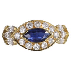 18kt Yellow Gold Solitaire Ring with Sapphire and Diamonds