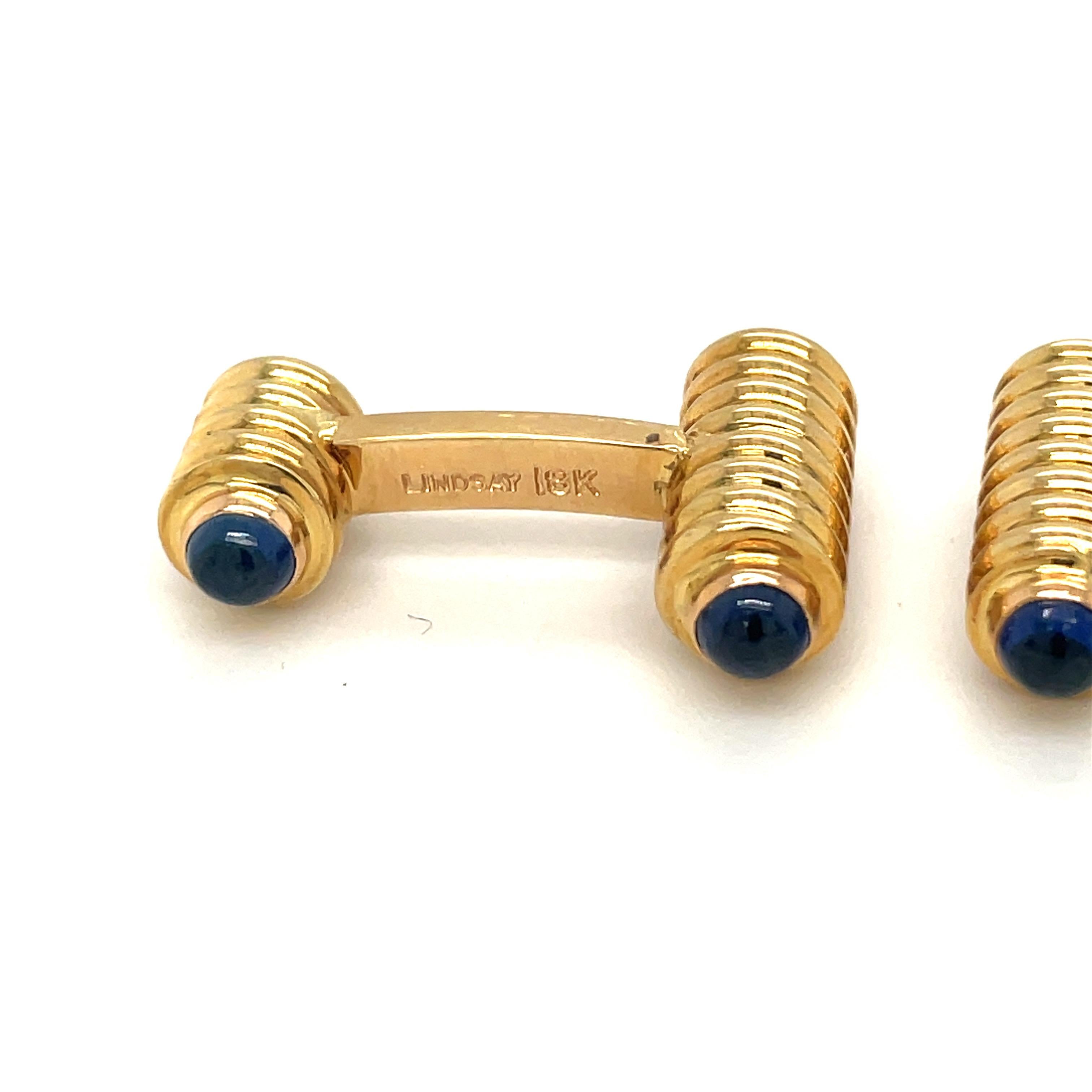 Contemporary 18KT Yellow Gold Spiral Bar Cuff Links with Blue Sapphire Cabochons For Sale