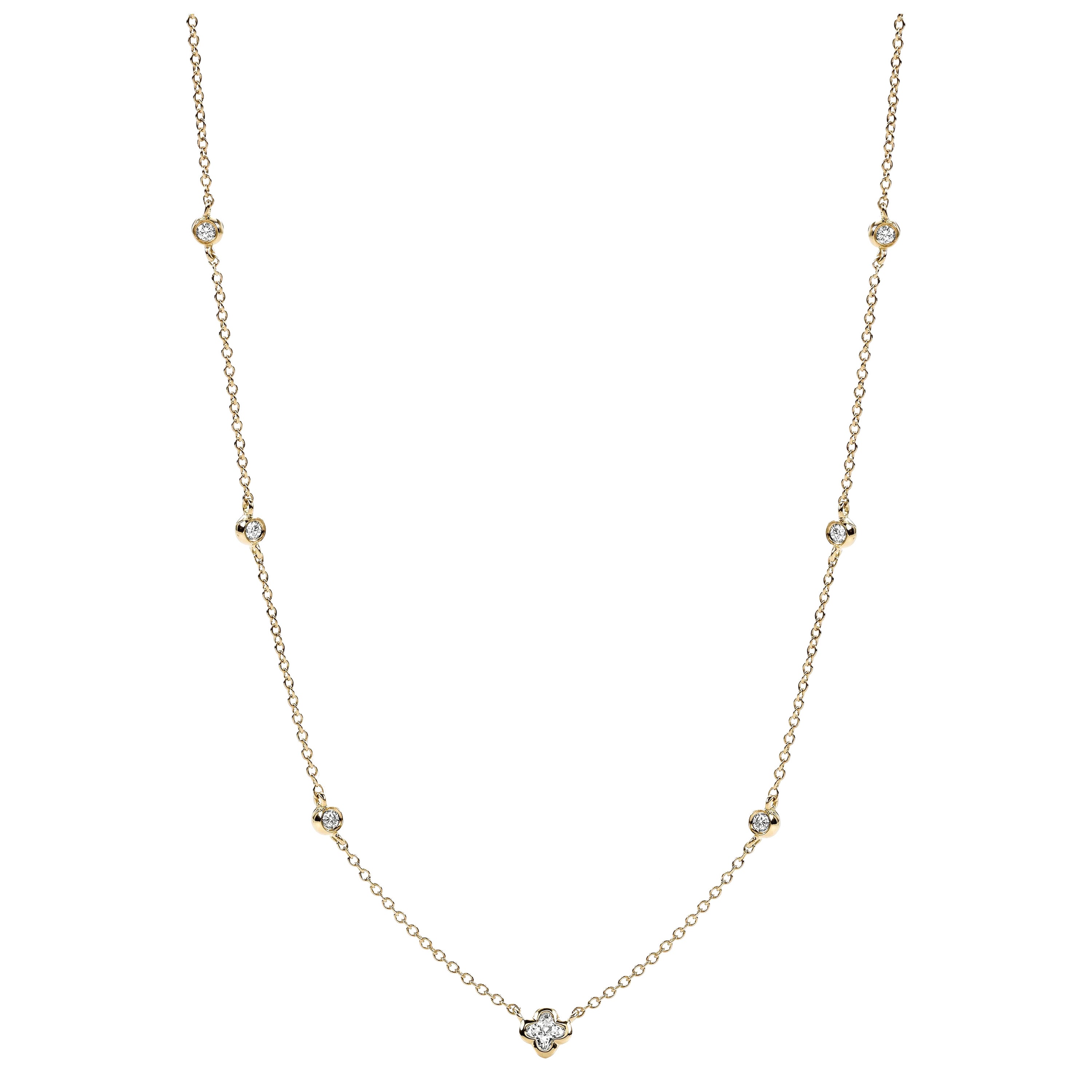 Collana con diamanti tondi e fiori in oro giallo 18KT 0,35ct in totale