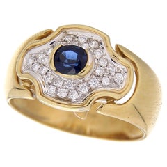 Bague vintage en or jaune 18 carats avec diamants et saphirs bleus ovales