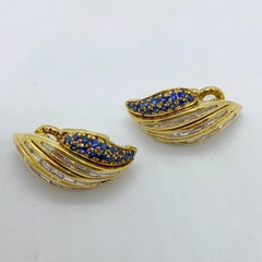 18 Karat Yellow Gold Winged Earrings with Baguette Diamonds and Blue Sapphires