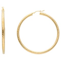 Pendientes de oro amarillo de 18 quilates con 2,50 gramos y aro de 40 mm