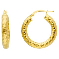 Pendientes de oro amarillo de 18 quilates con 3,20 gramos y aro de 15 mm