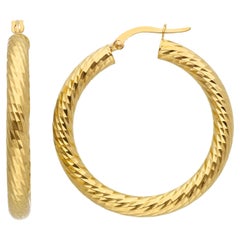 Pendientes de oro amarillo de 18 quilates con 5,30 gramos y aro de 25 mm