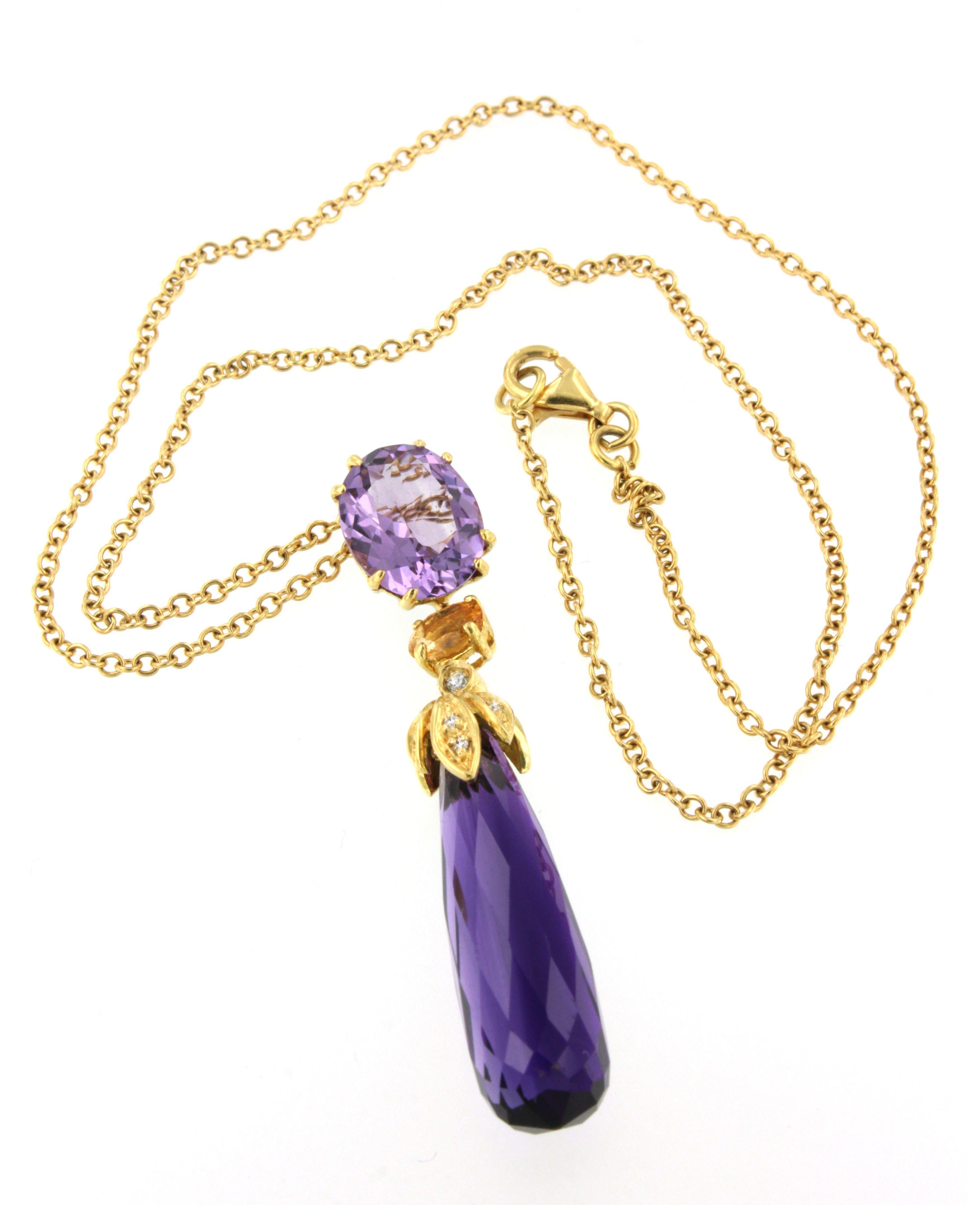 Classical shapes create a unique jewel made in Italy by Stanoppi Jewellery since 1948.
 Trendy and pretty pendant by Stanoppi Jewellery . The combination of colors is very unique.
Amethyst (drop cut, size: mm), Citrine (oval cut, size: mm) and White