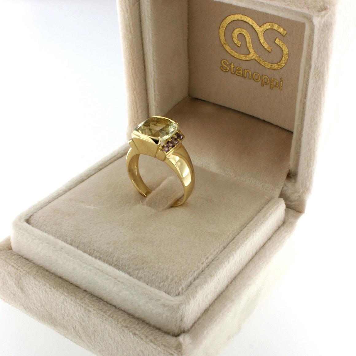 Cocktail ring in yellow gold 18kt with lemon quartz Cushion cut and amethyst . 
very nice , modern  ring, easy to wear every day. 
g. 8,00  

All Stanoppi Jewelry is new and has never been previously owned or worn. Each item will arrive at your door