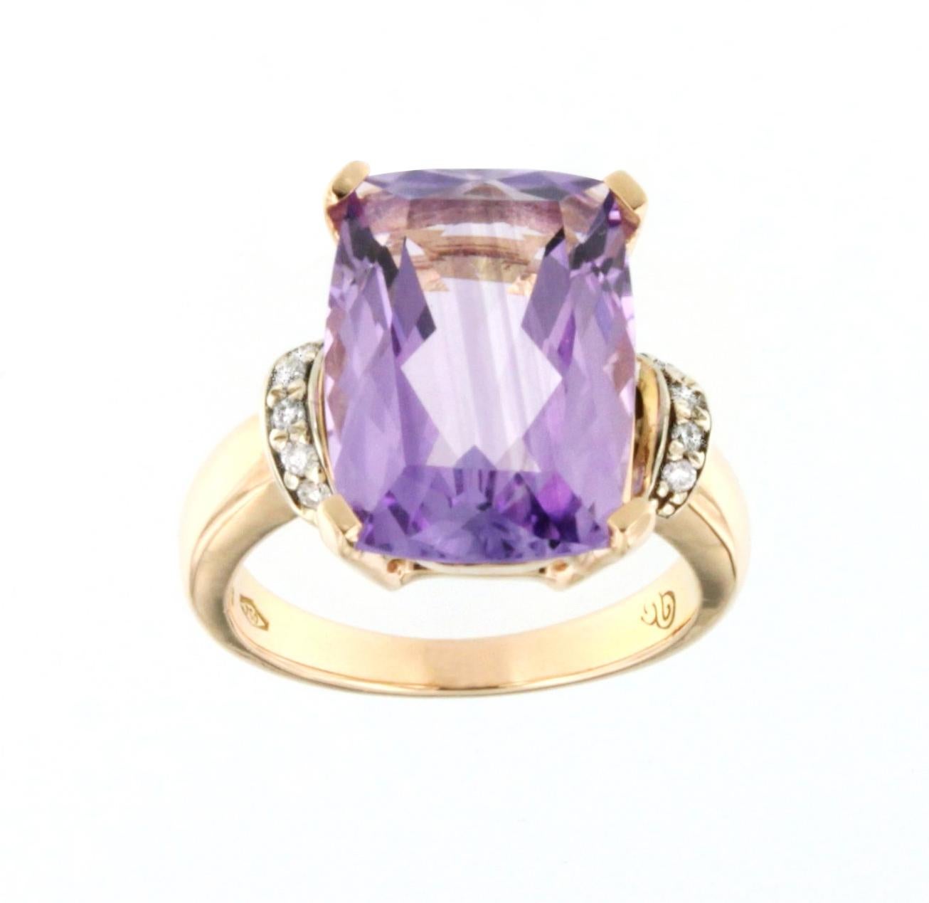 Natural Amethyst for this elegant , timelwss ring in yellow gold with white diamands cts 0.10 (quality VS  G/H  cts 0.10 ) 
All our jewels are made entirely in Italy in our laboratory since 1948 . We create, we produce everything inside our